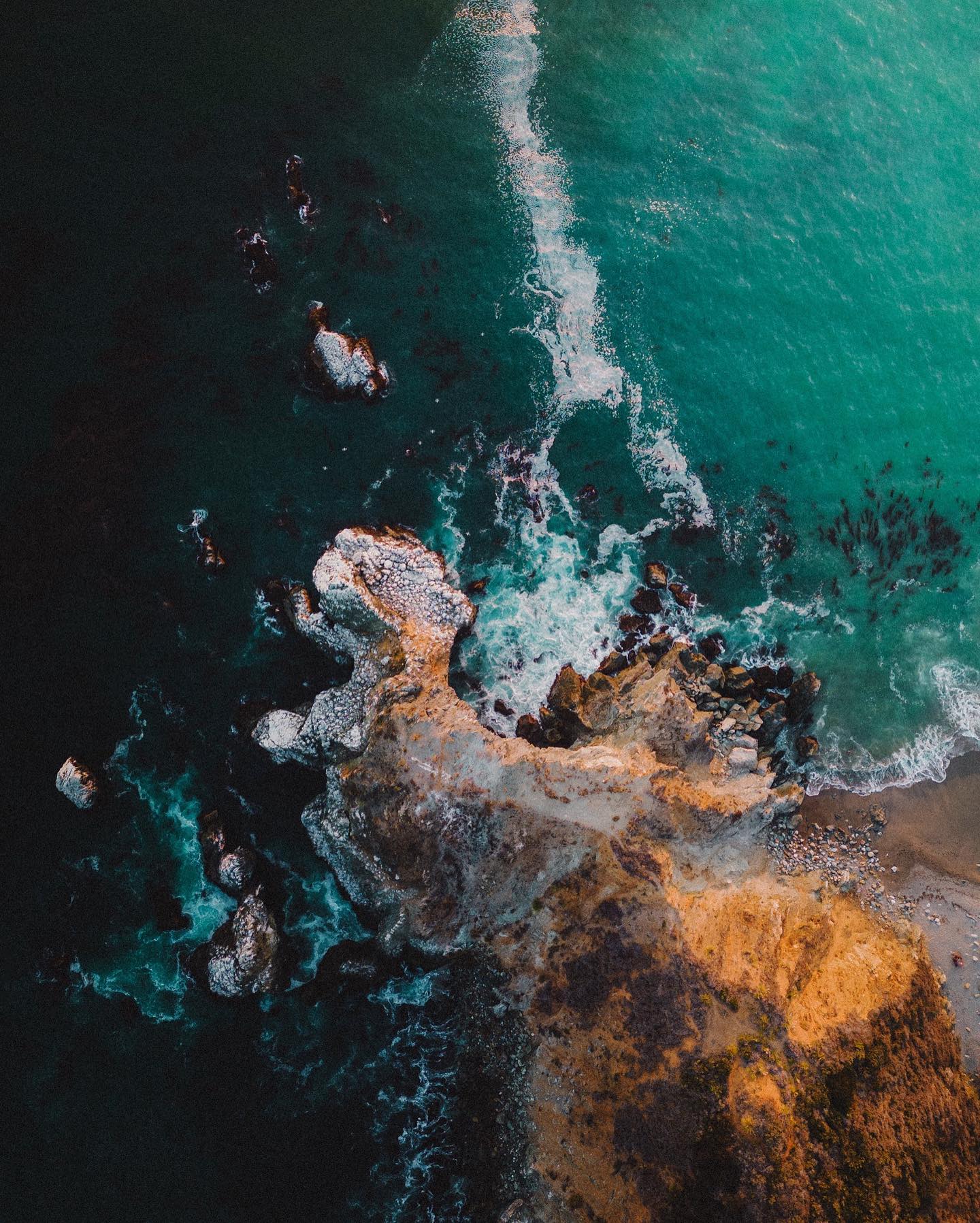 Rugged cliffs overlooking a misty ocean