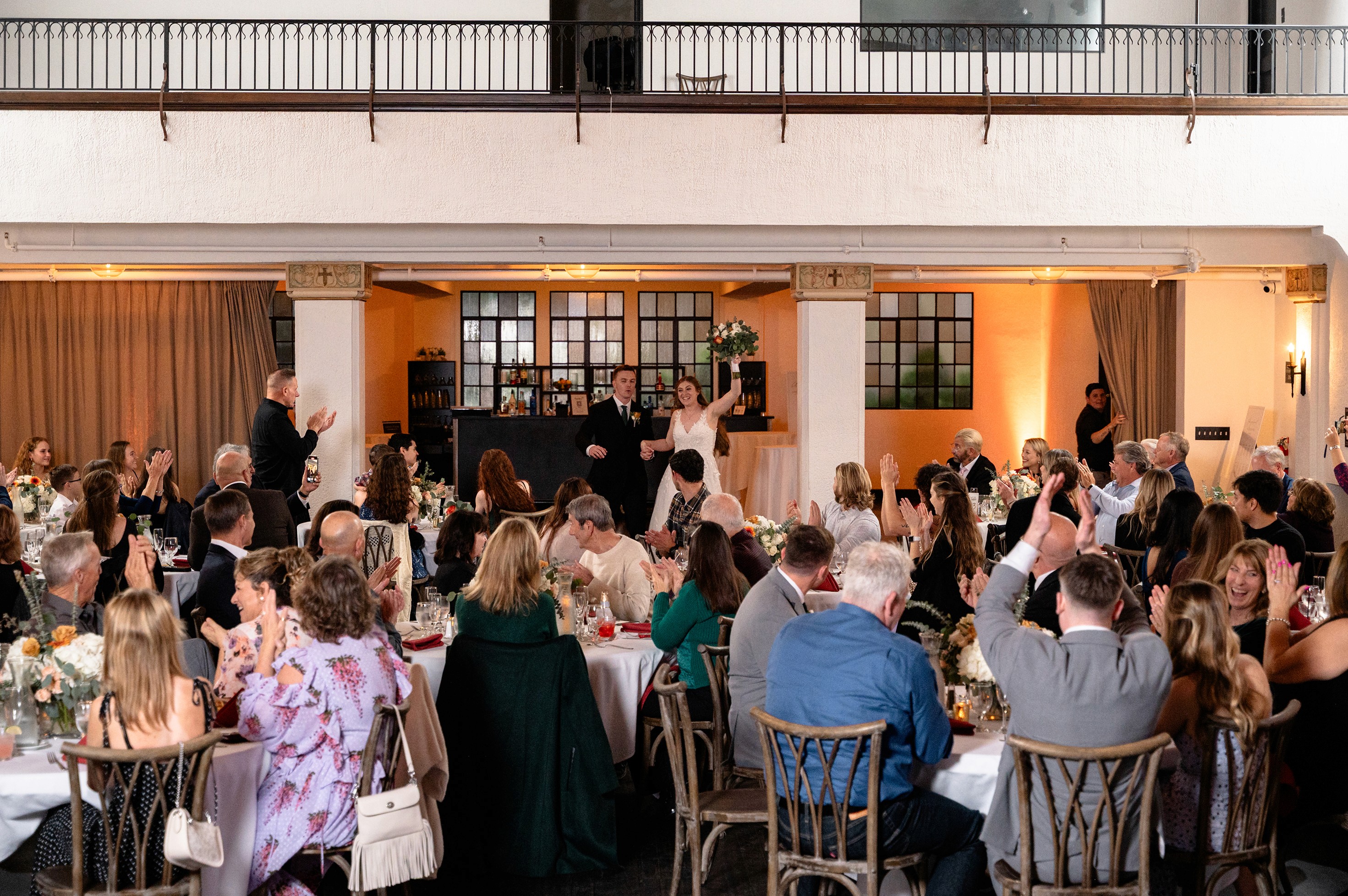 Flat lay wedding details with bouquet, rings, and sparkling bridal heels