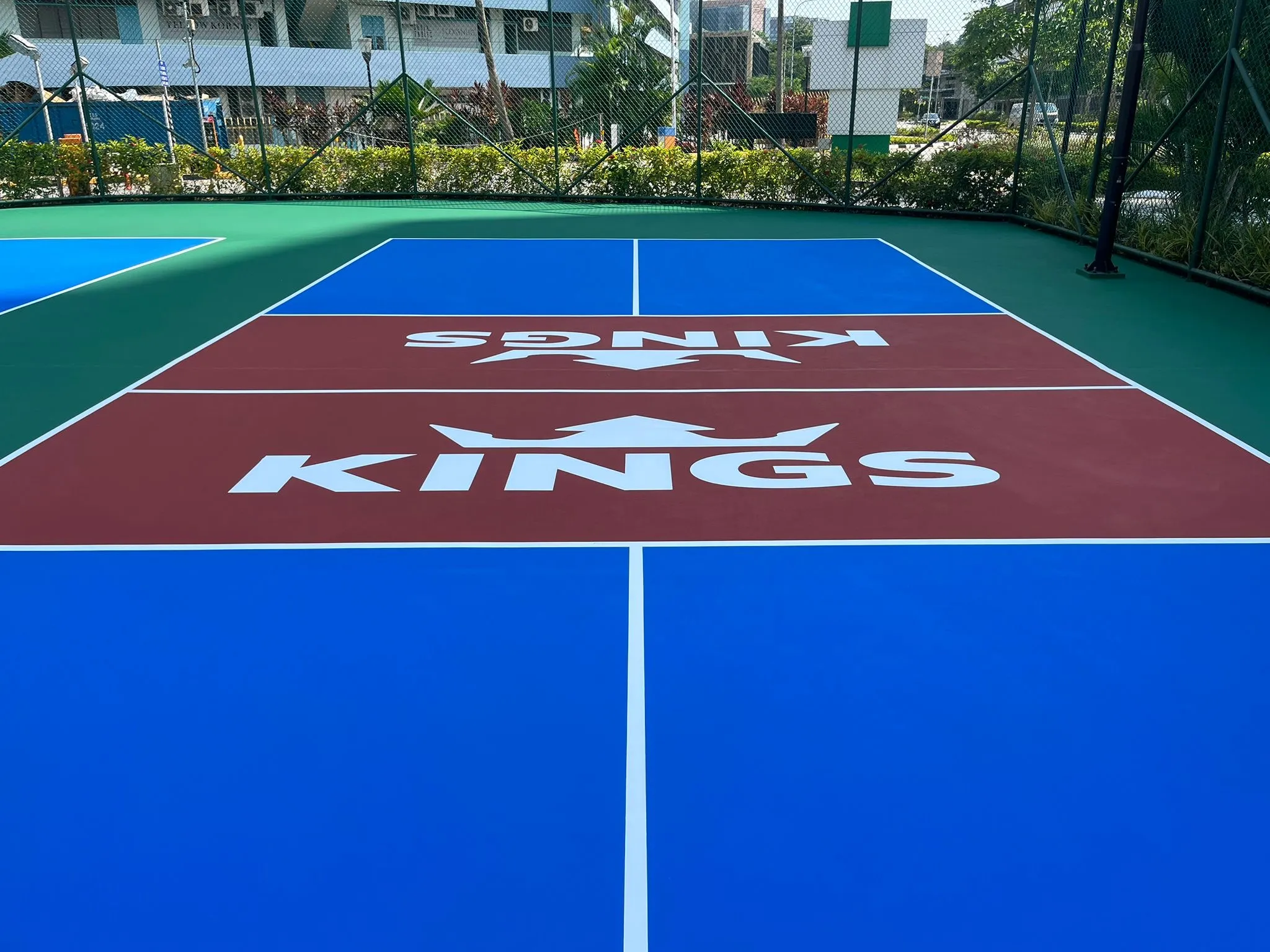 a close up of a roof with a blue sky in the background