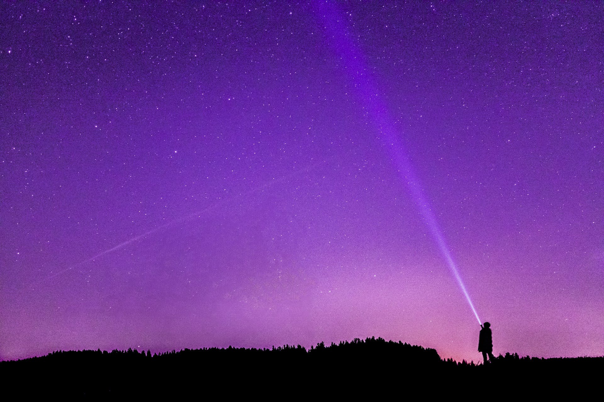 A person looking at the stars
