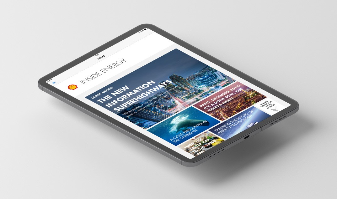 Shell Inside Energy App design with digital iPad showing app cover page