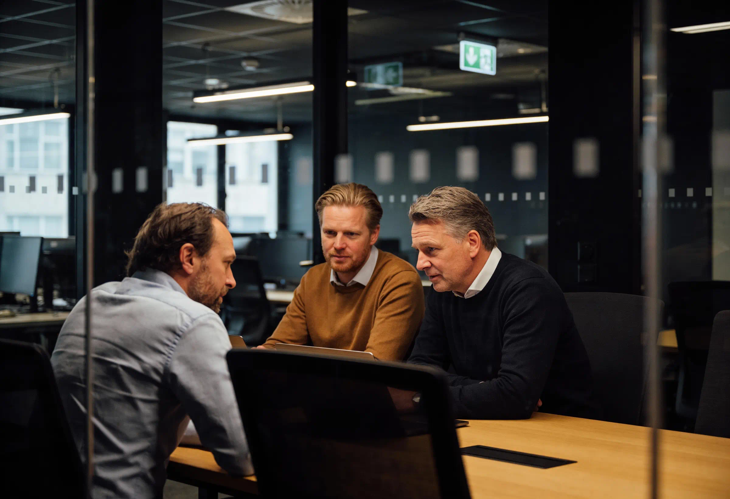 two employees talking