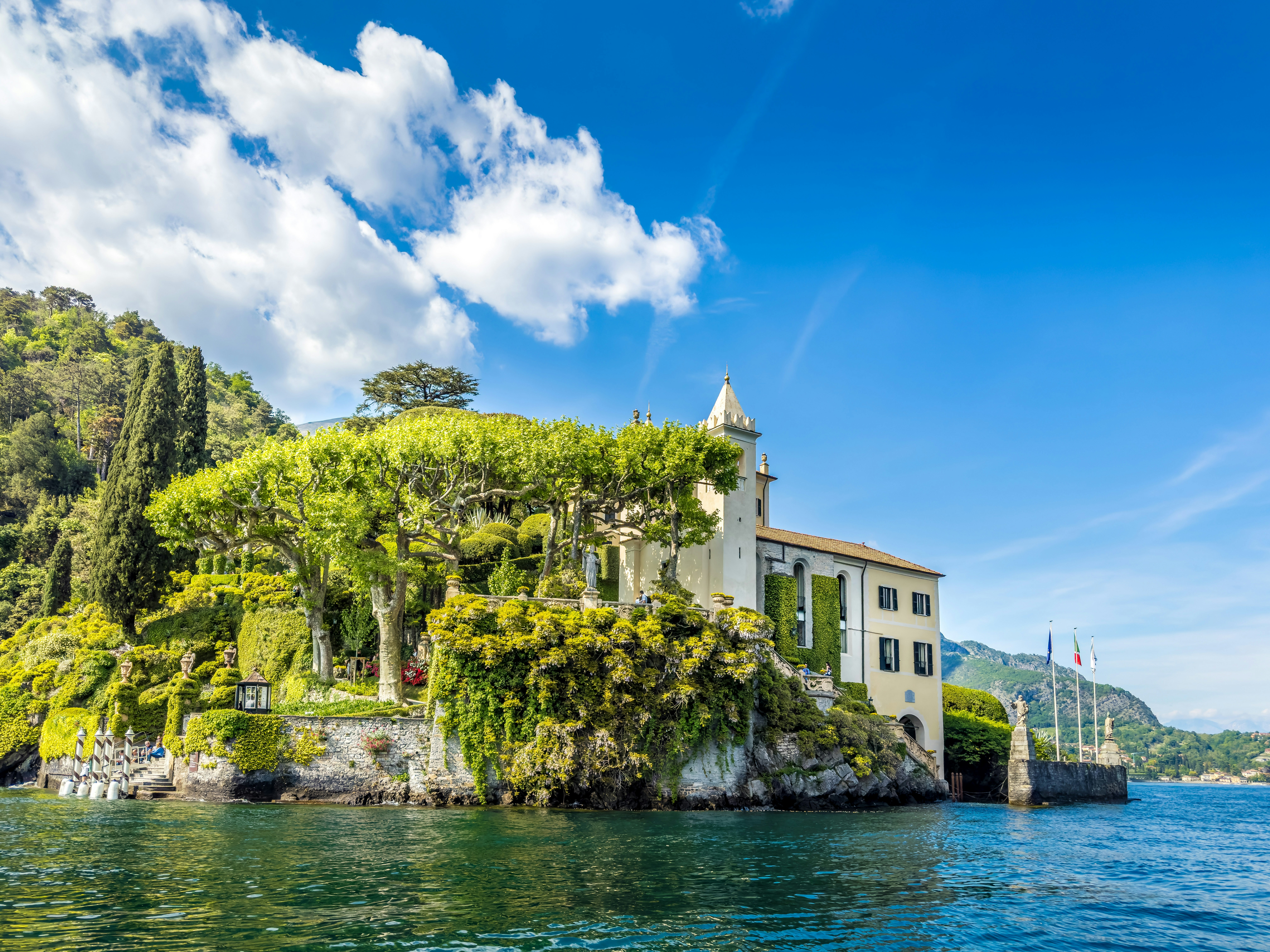 a house on a small island in the middle of the water