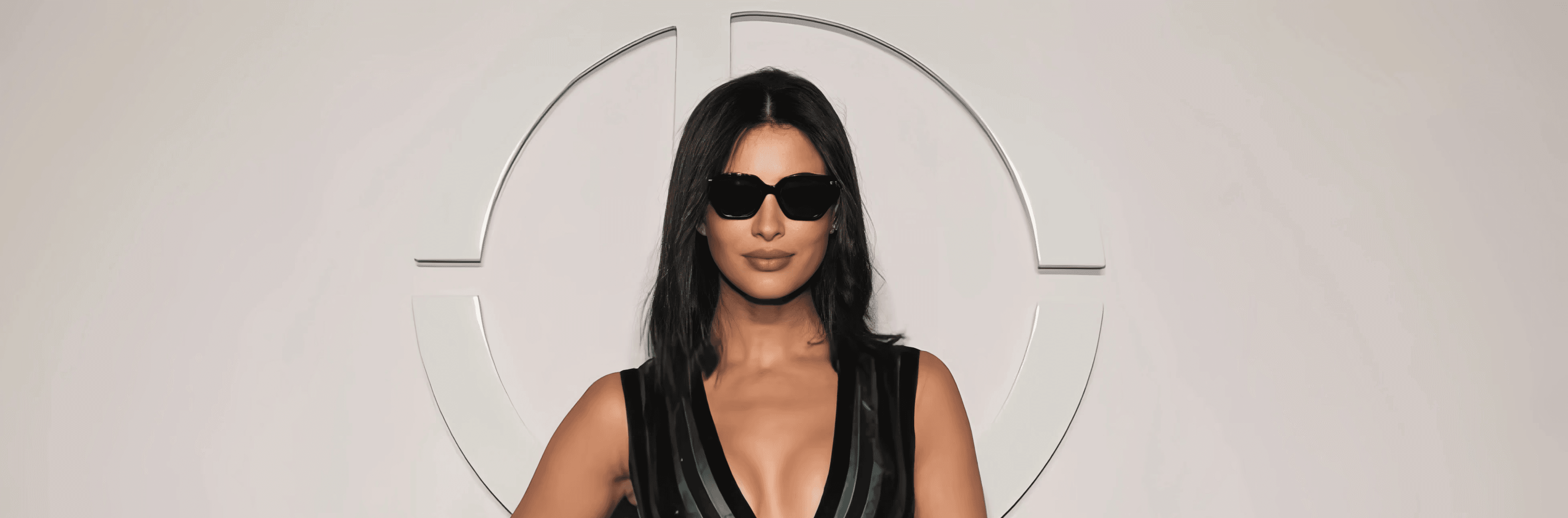 Laptop displaying website on wooden table