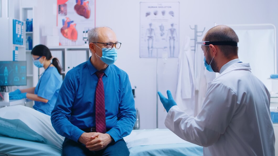 A doctor checking on a patient on the round.