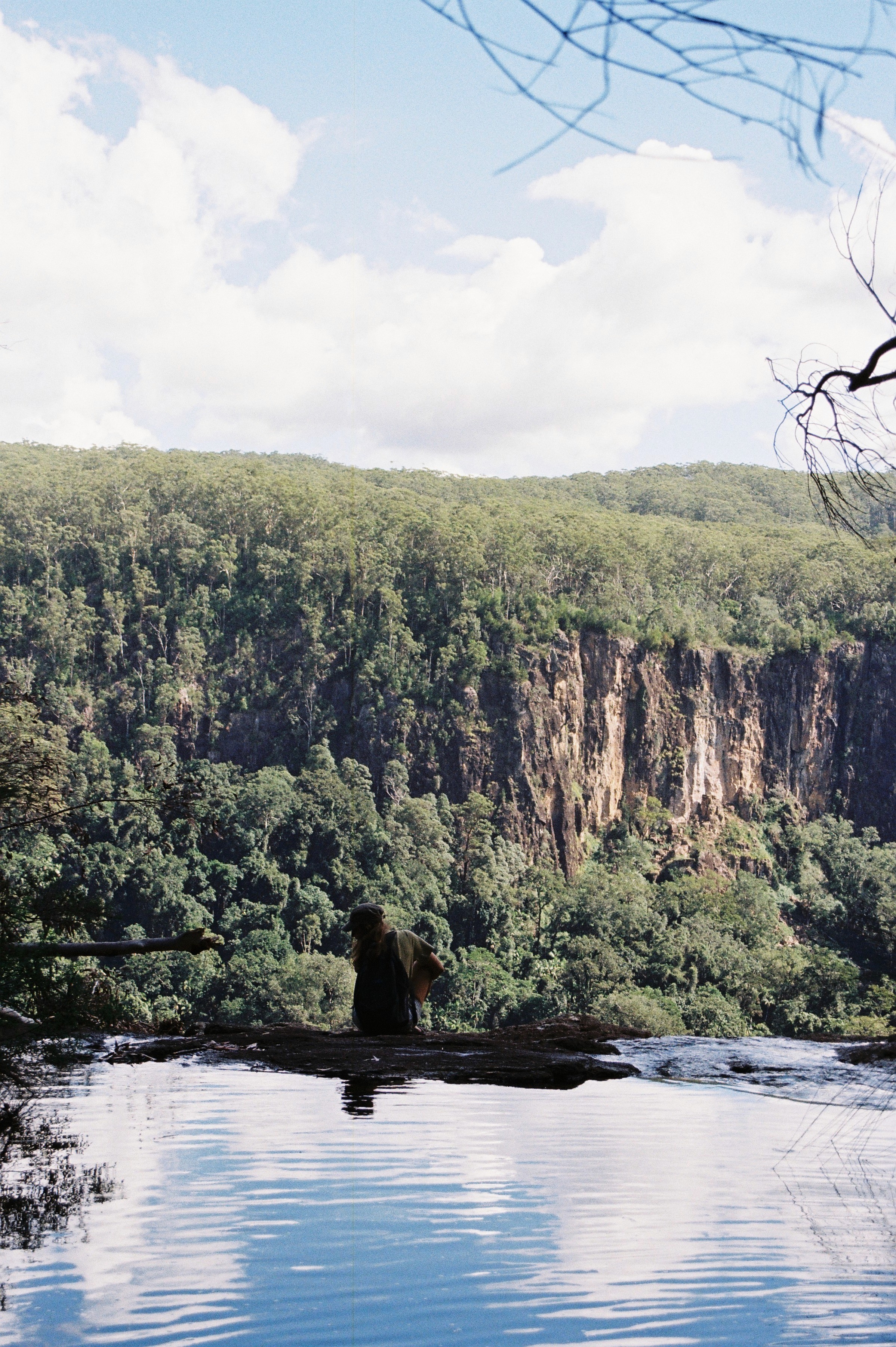 Surfer cleaning Surf board