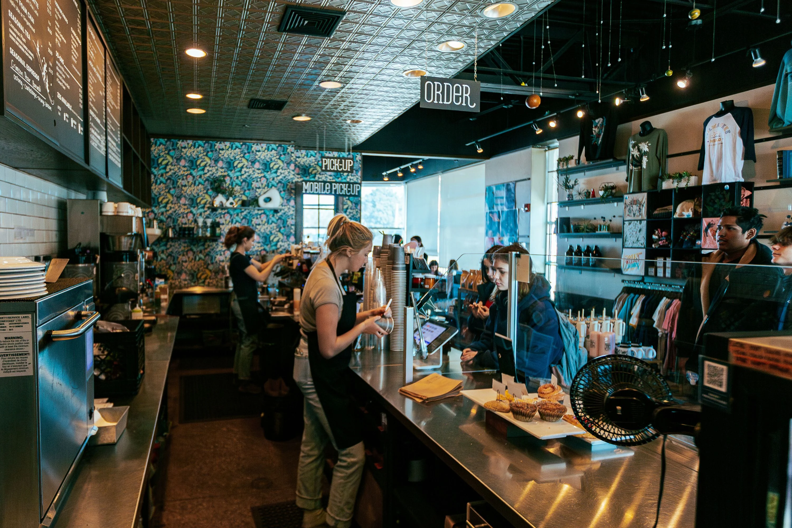 black laptop computer on white table