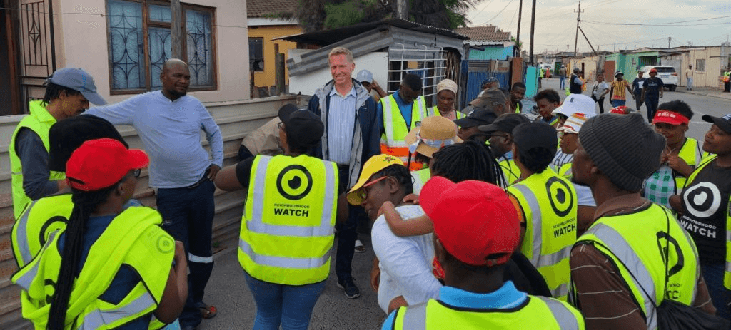 woman in gray hijab and gray coat