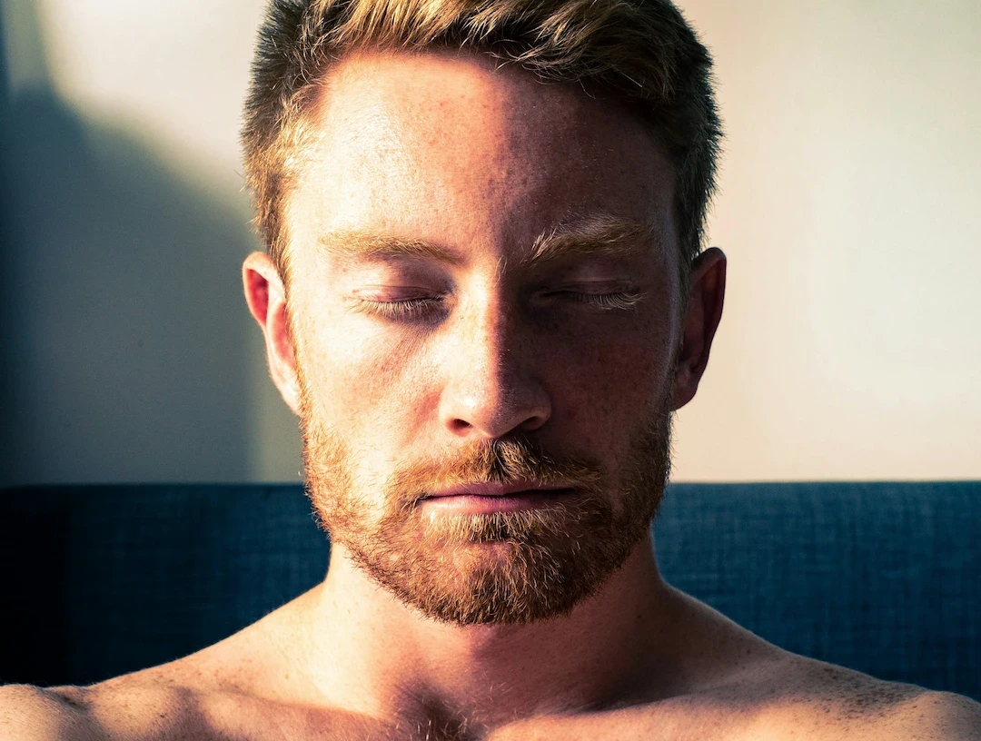 Man with eyes closed