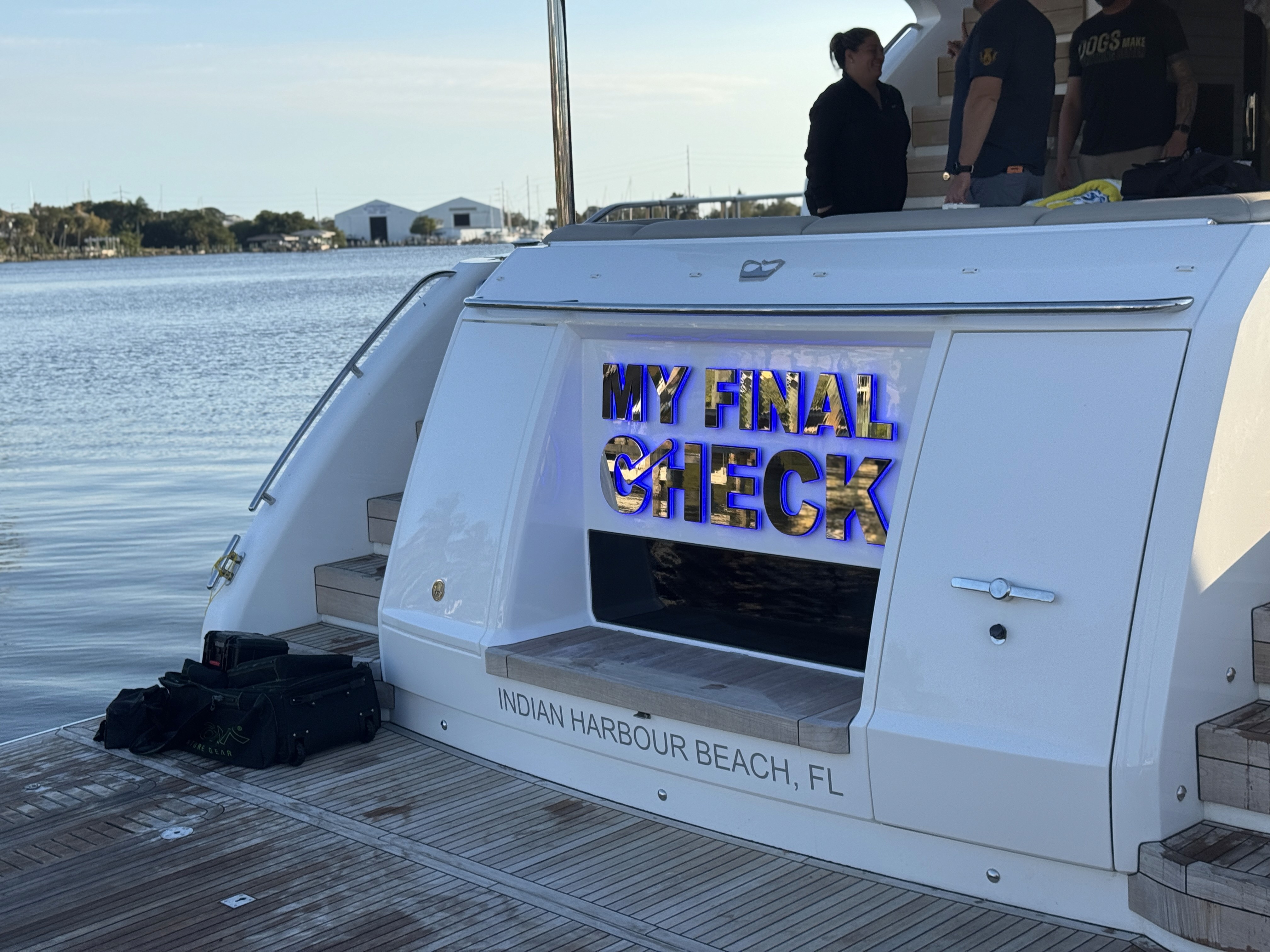 Custom hull name lettering and graphics on boat transom in Indian Harbour Beach FL