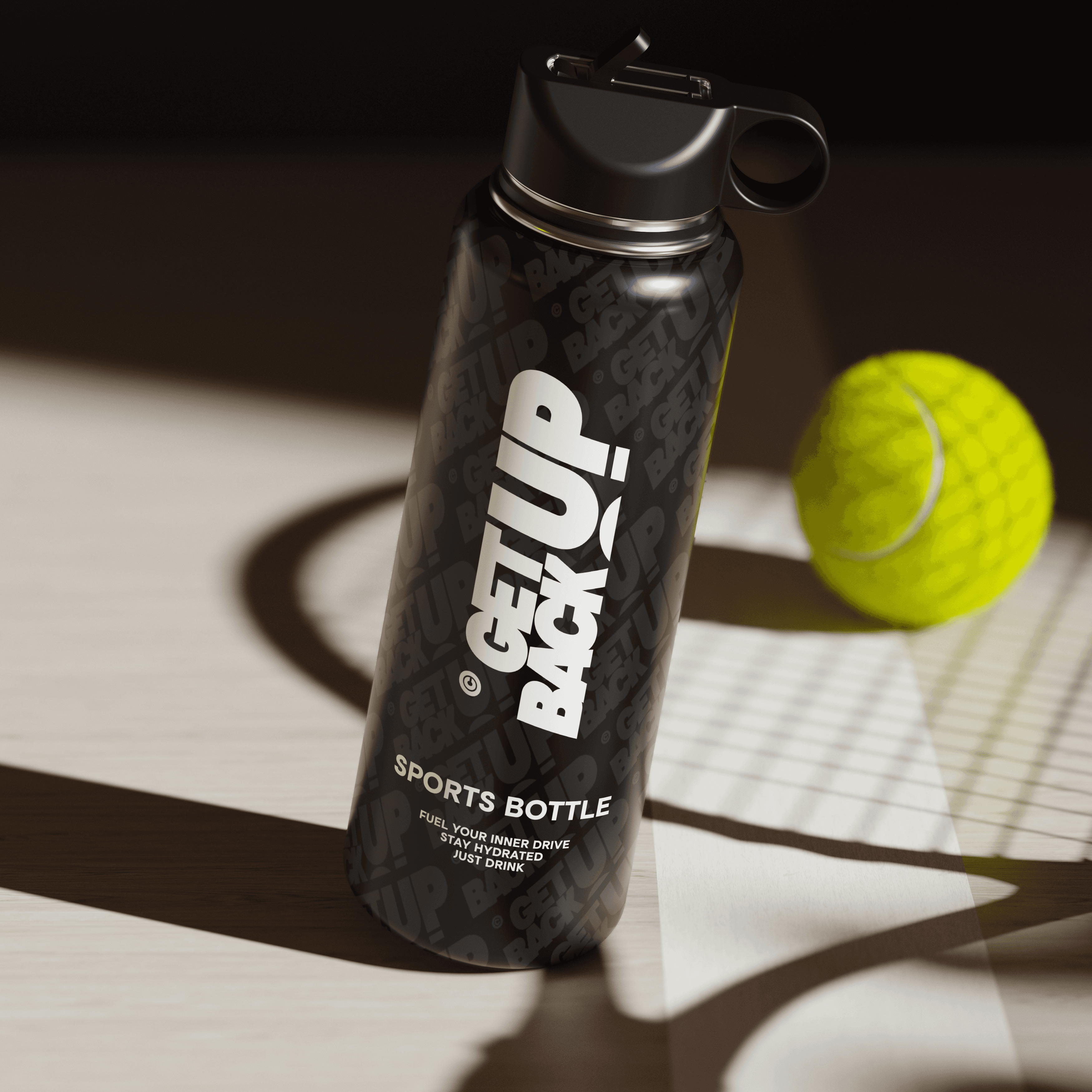 Black sports bottle with bold "Get Up Back!" branding, placed on a wooden surface beside a tennis ball, promoting hydration for active lifestyles.