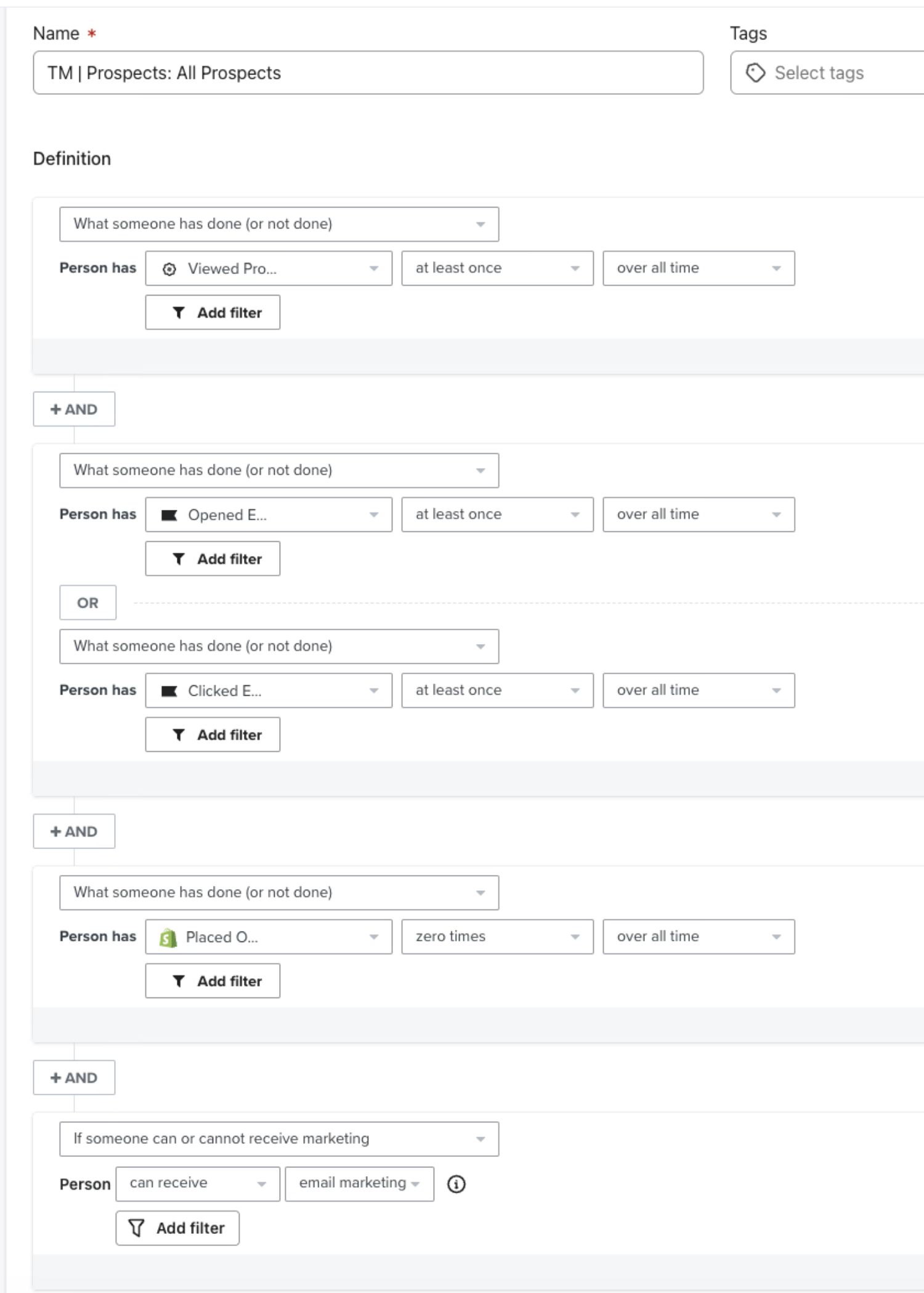  The image shows a segmentation setup in Klaviyo named "TM | Prospects: All Prospects." The criteria for this segment include individuals who have viewed a product at least once over all time, opened or clicked an email at least once over all time, and placed zero orders over all time. Additionally, it filters for individuals who can receive email marketing because they are subscribed. The interface allows further customization with dropdown menus, logical "AND/OR" operators, and options to add additional filters.