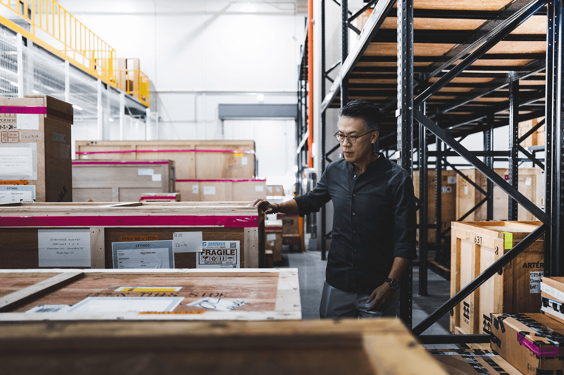 Eythos founder Lewis Cheng inspects the purpose-built art storage facility in Tsing Yi.