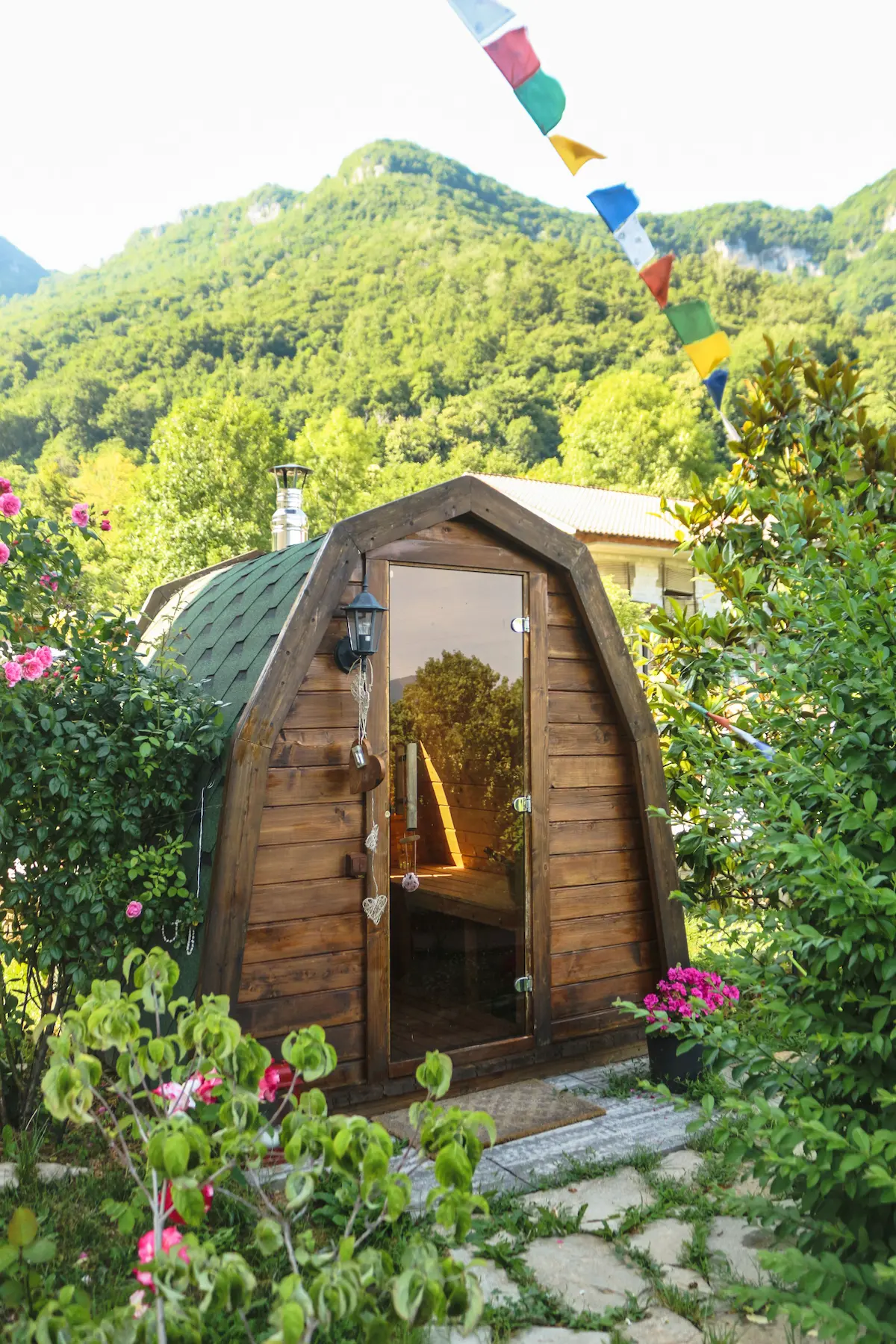 Cozy sleeping bed high in the mountain with a sunset view