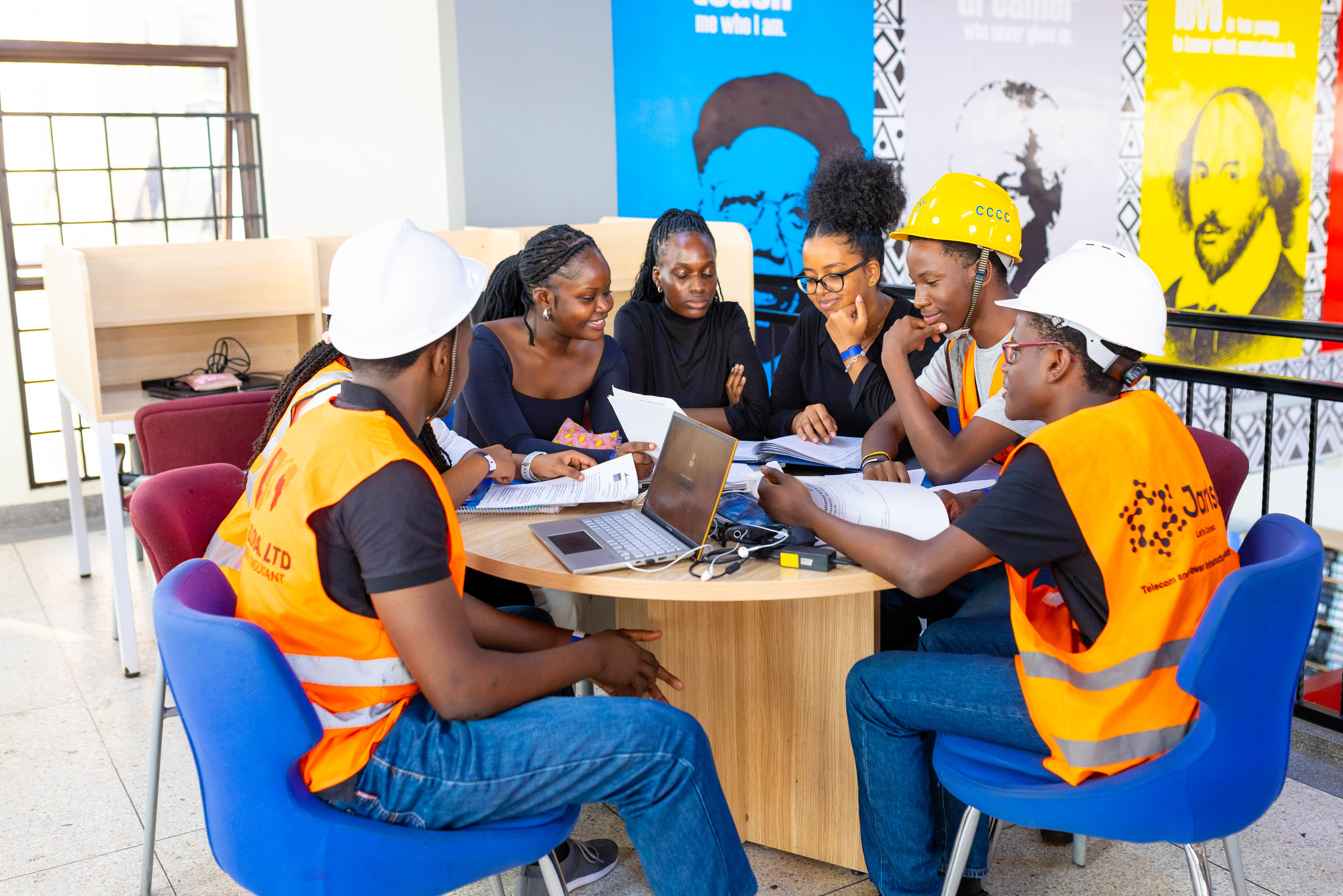 A school building stands against the backdrop of a clear sky