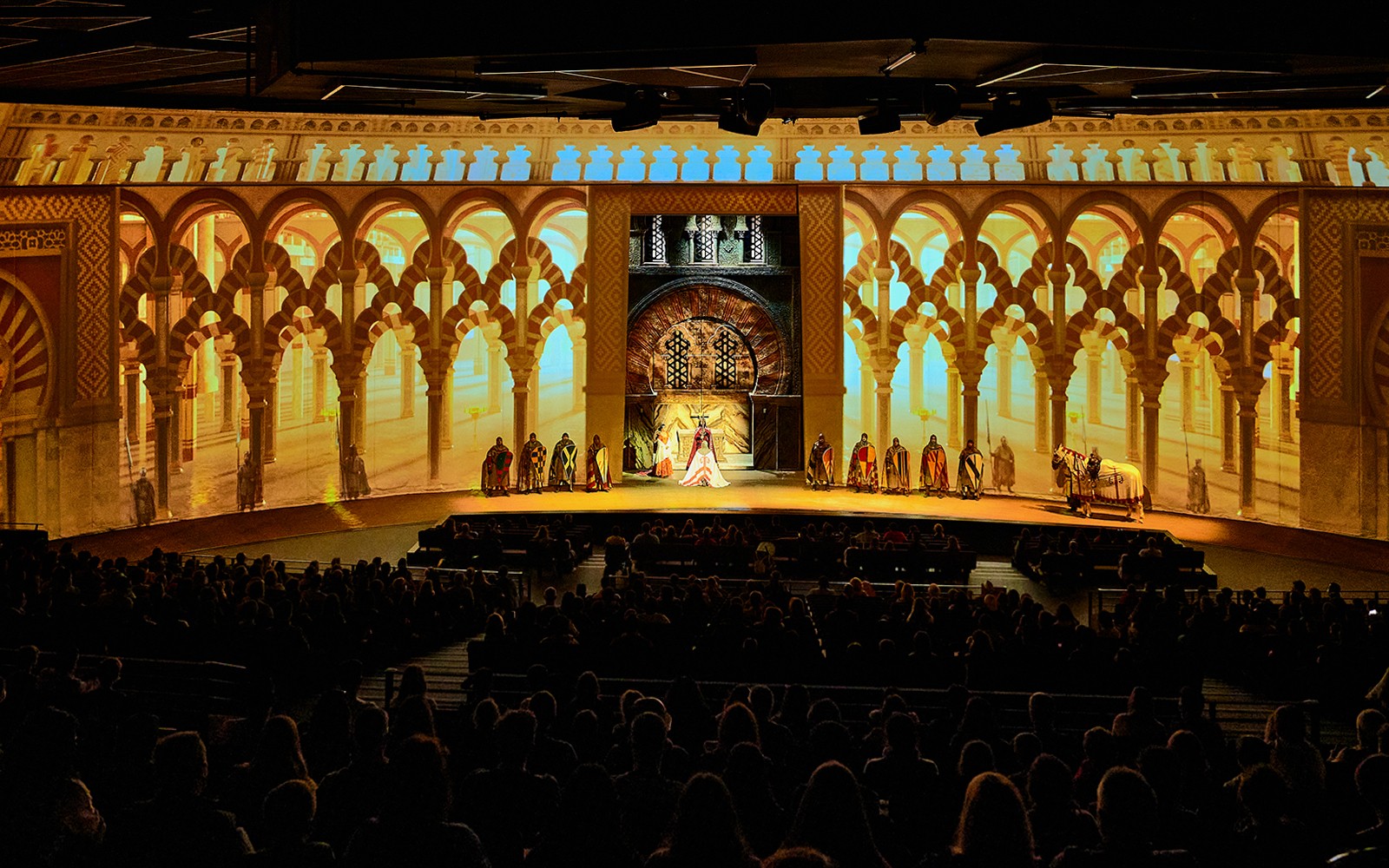 Performance of El Ultimo Cantar at Puy du Fou España with actors on stage.