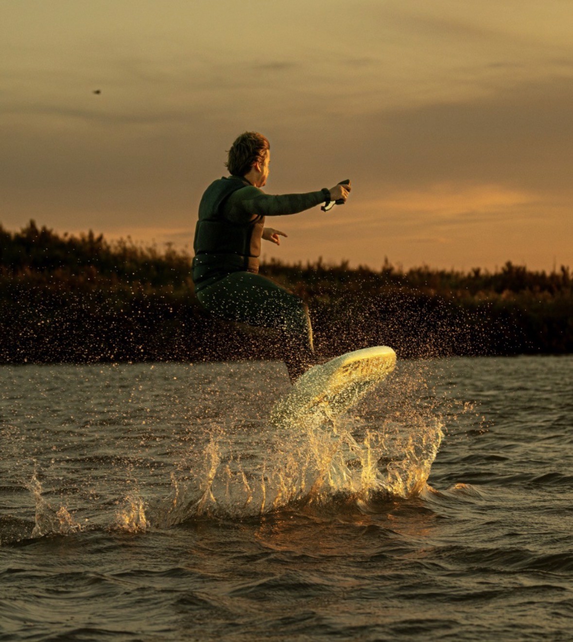 Group of men standing with Sufboard