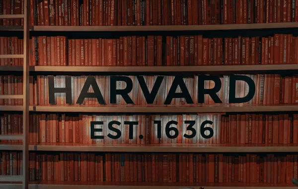 High school student conducting original research with a PhD mentor to strengthen their Harvard application