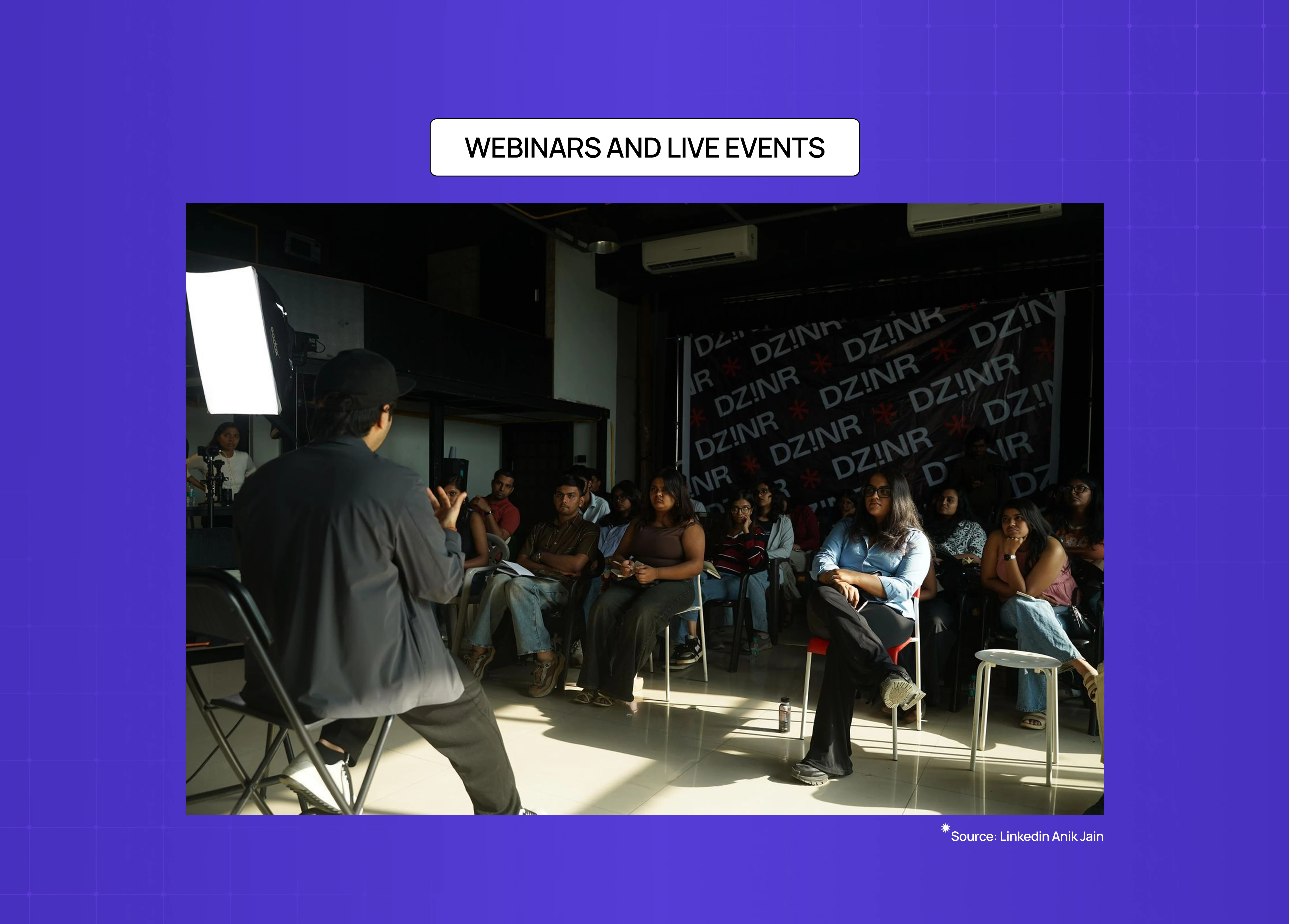Audience attending an in-person webinar or live educational event focused on networking, learning, and community engagement.