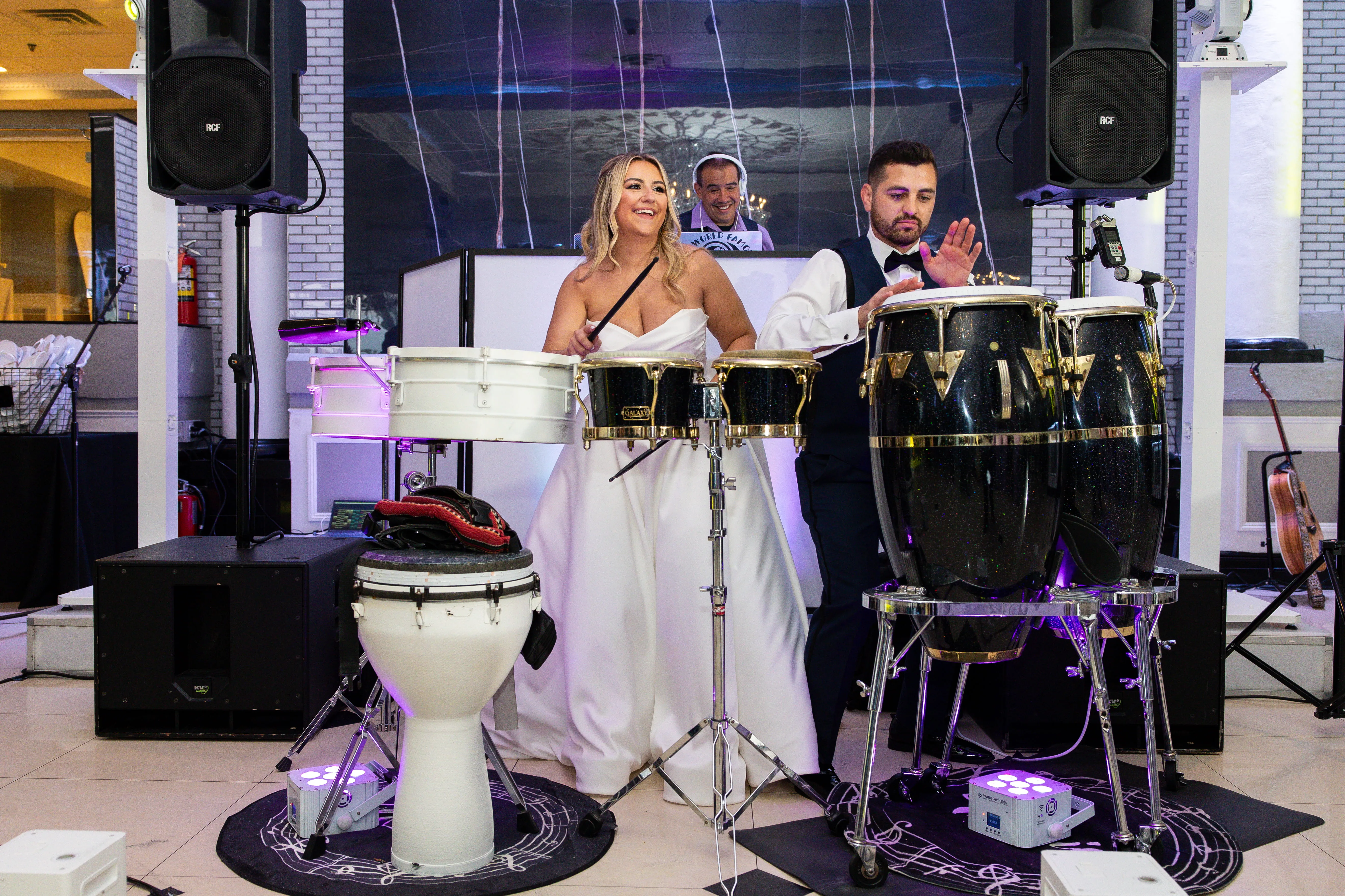 Live percussion and DJ setup at NYC wedding reception creating interactive music experience