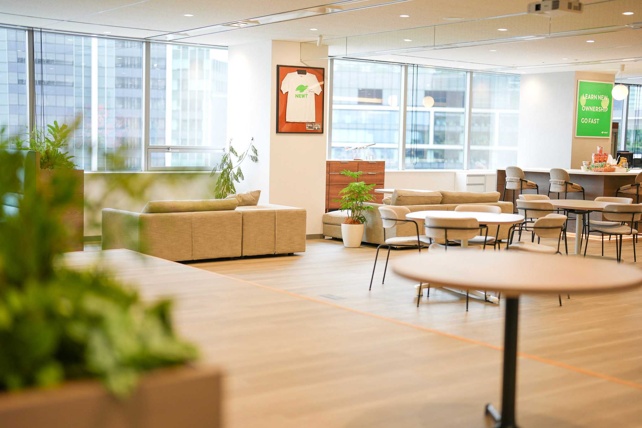 NEWT Premium Lounge Shibuya interior with sofas and greenery