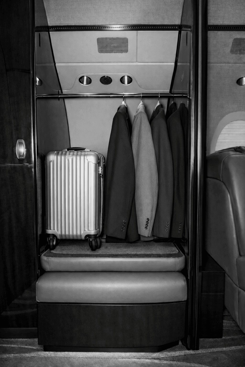 Citation Latitude onboard wardrobe with business suits hanging up