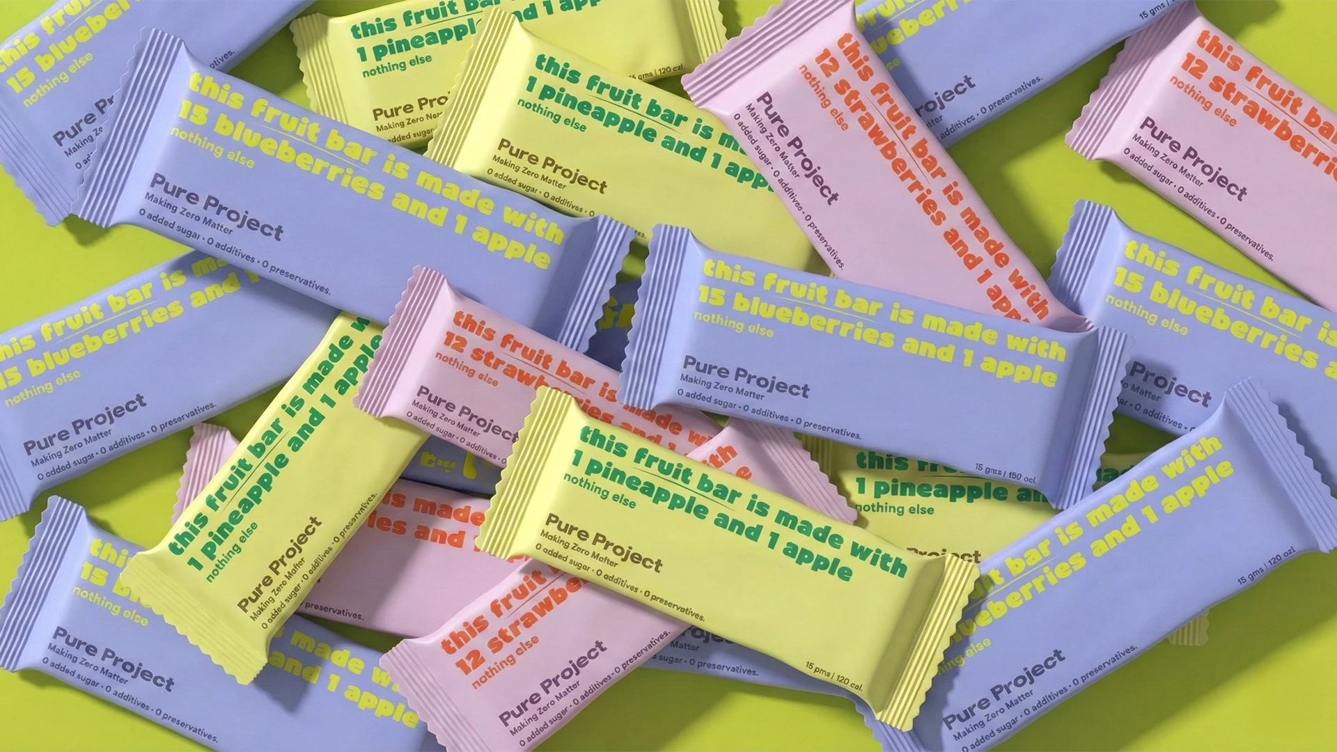 Pure Project fruit bars photographed with fresh fruit ingredients