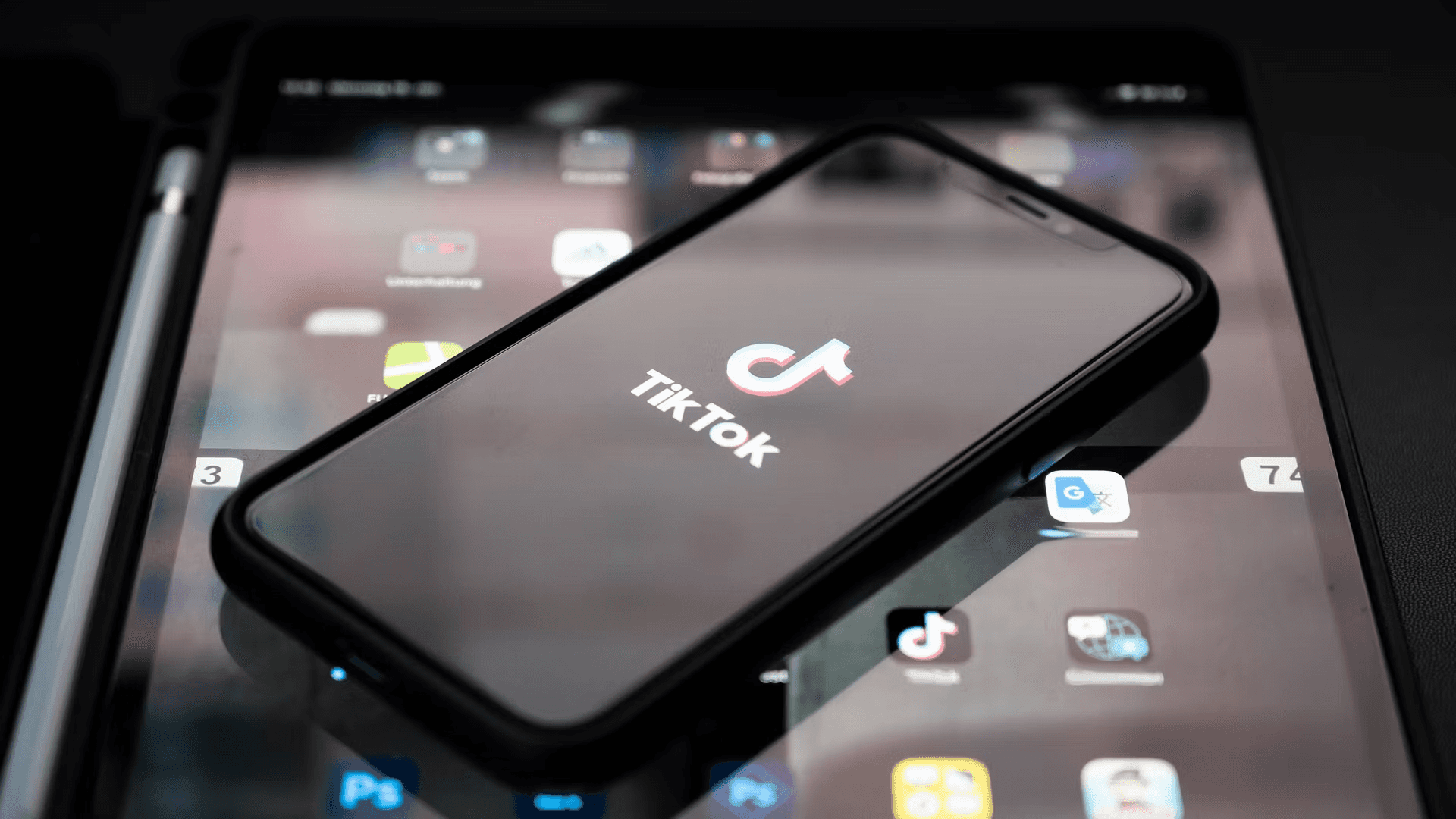  Smartphone with TikTok logo on tablet - Best Content for TikTok