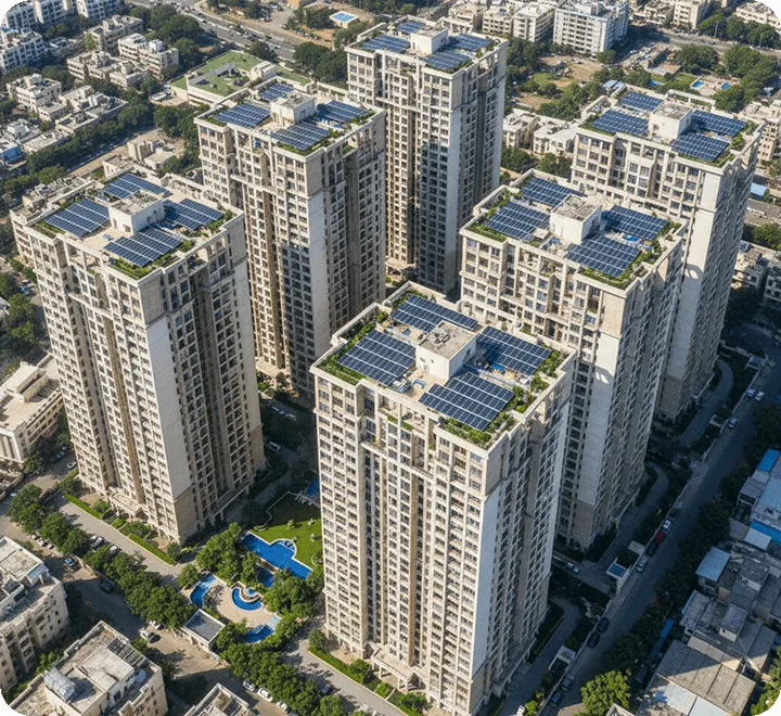 Aerial view of tall residential apartment towers in a housing society