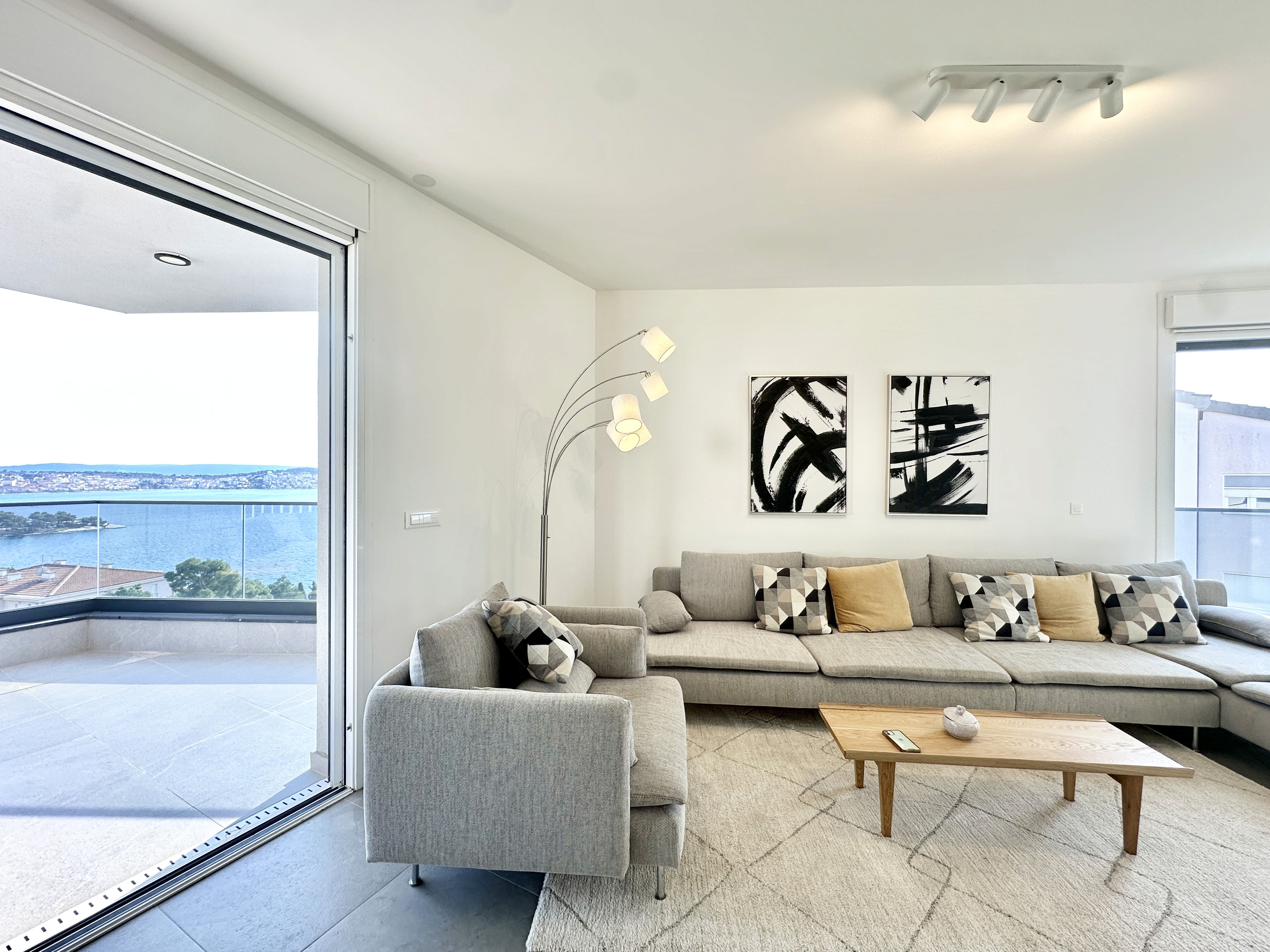 Large modern interior space with concrete walls