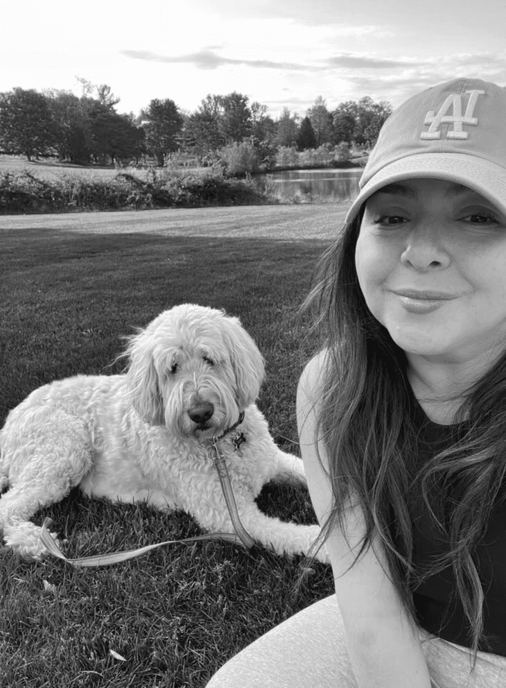 Maria and belle sitting on a park