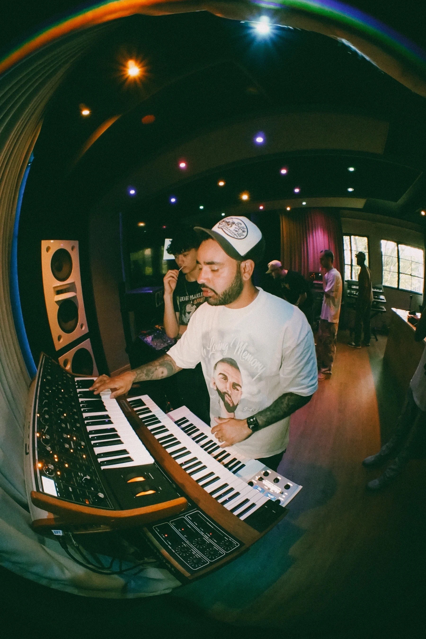 man playing a synthesizer