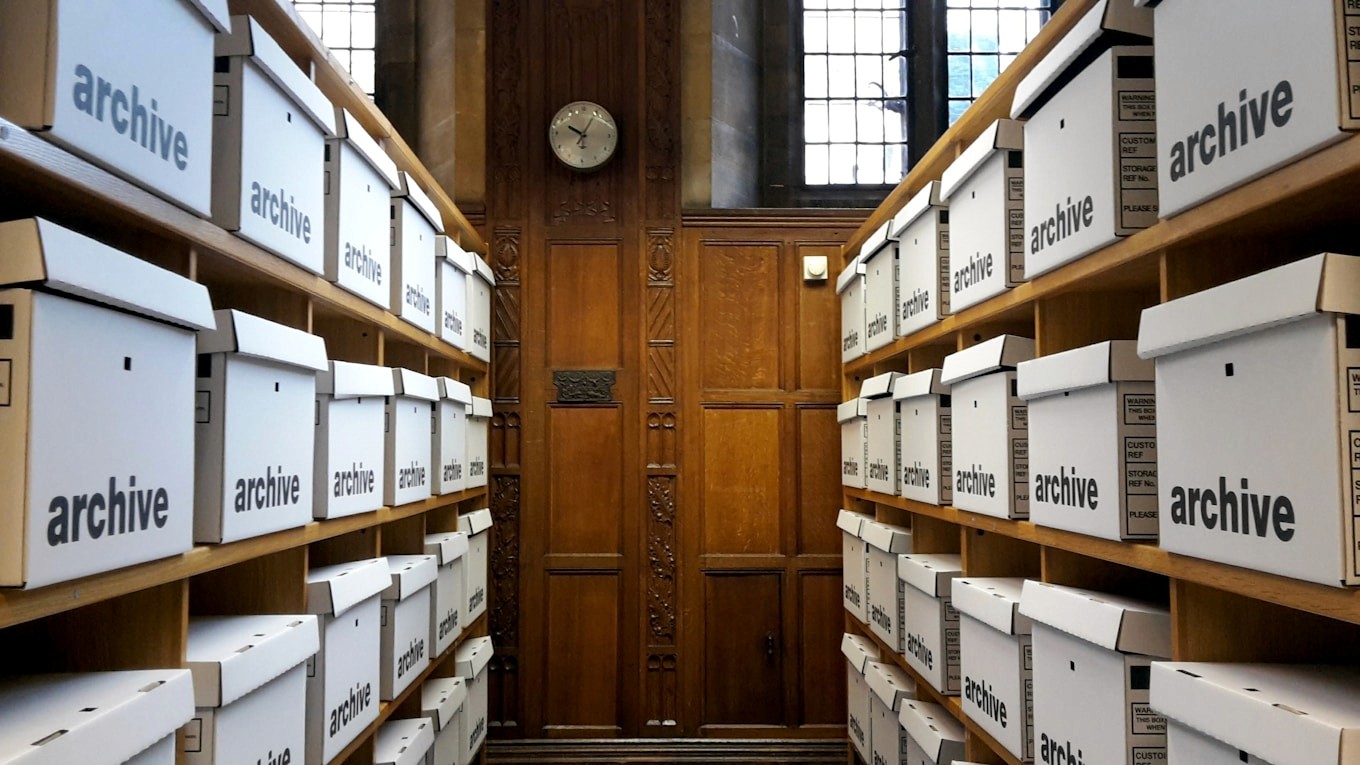 Rows of archive boxes on shelves