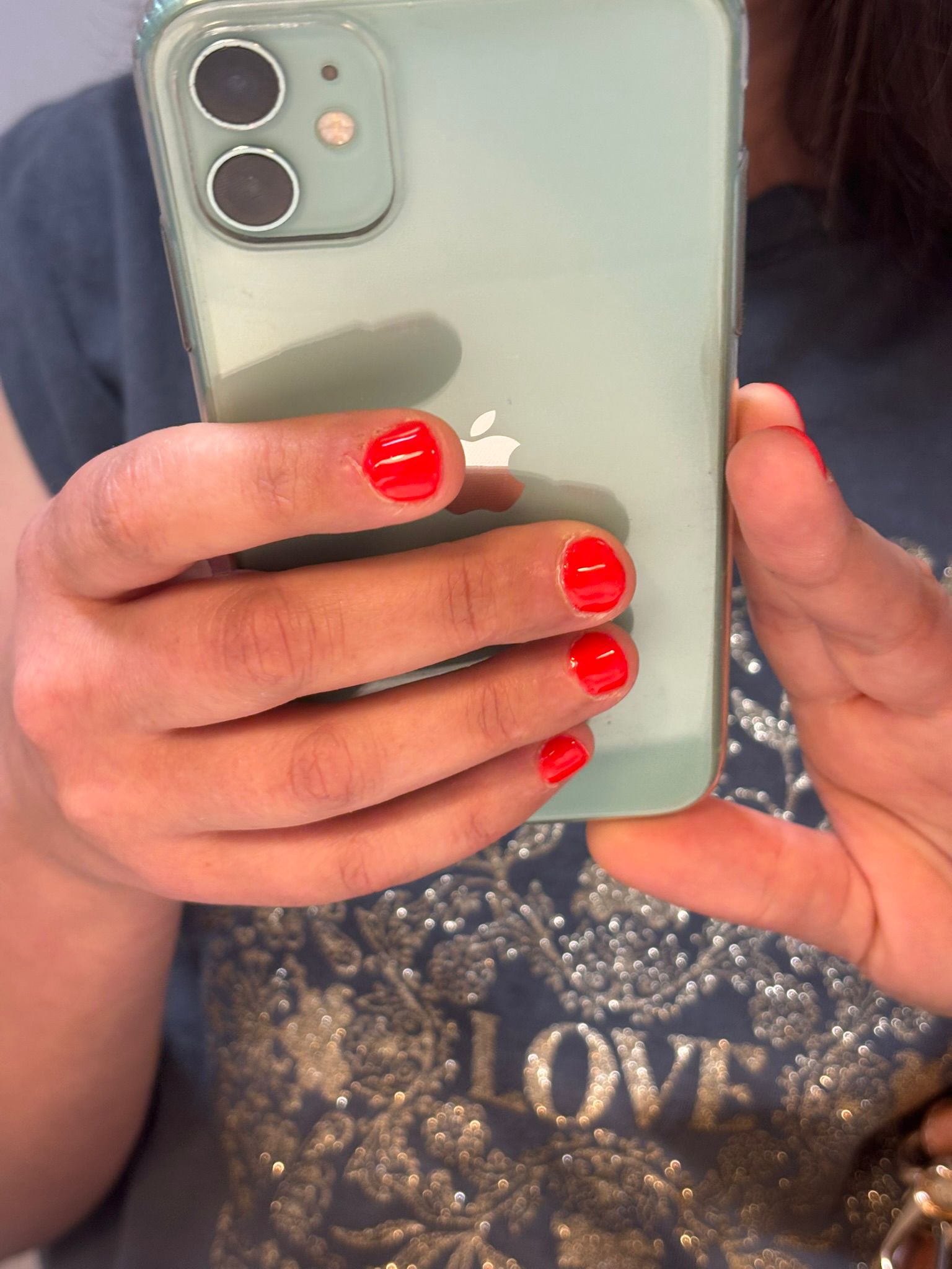 woman's nails with manicure