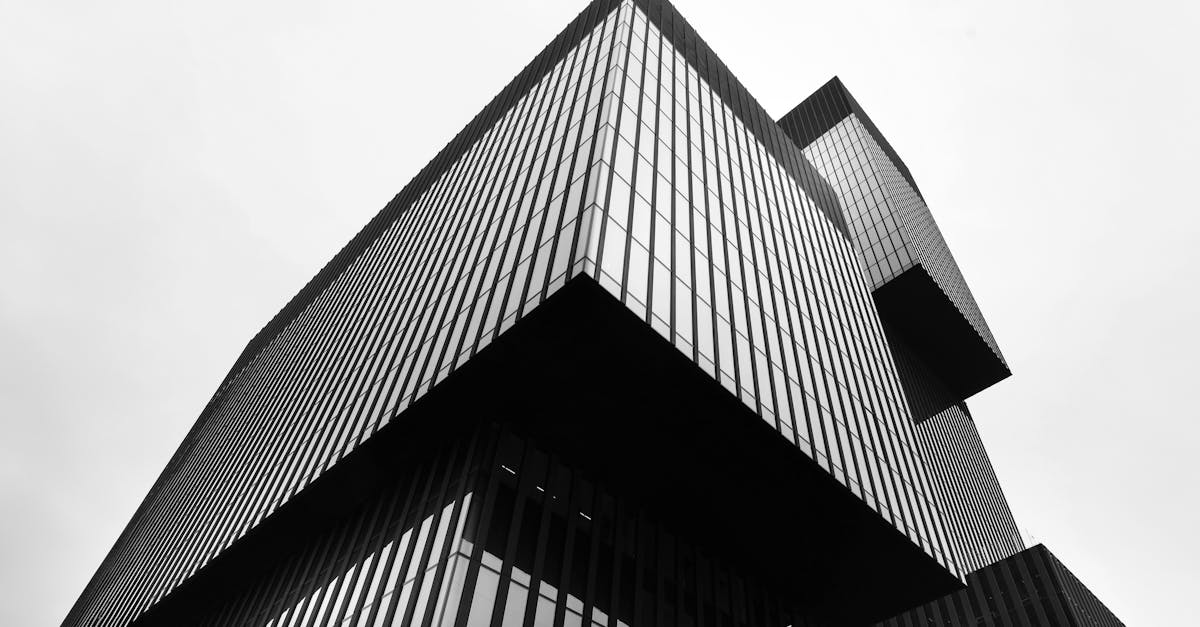 Black and white perspective of a modern building in Katowice, highlighting geometric design features