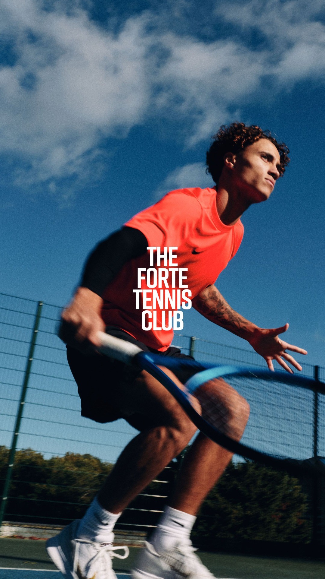 Bride and groom walking on street at night