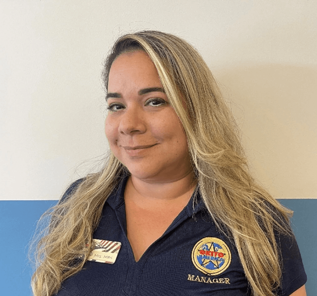 Headshot phot of Maria