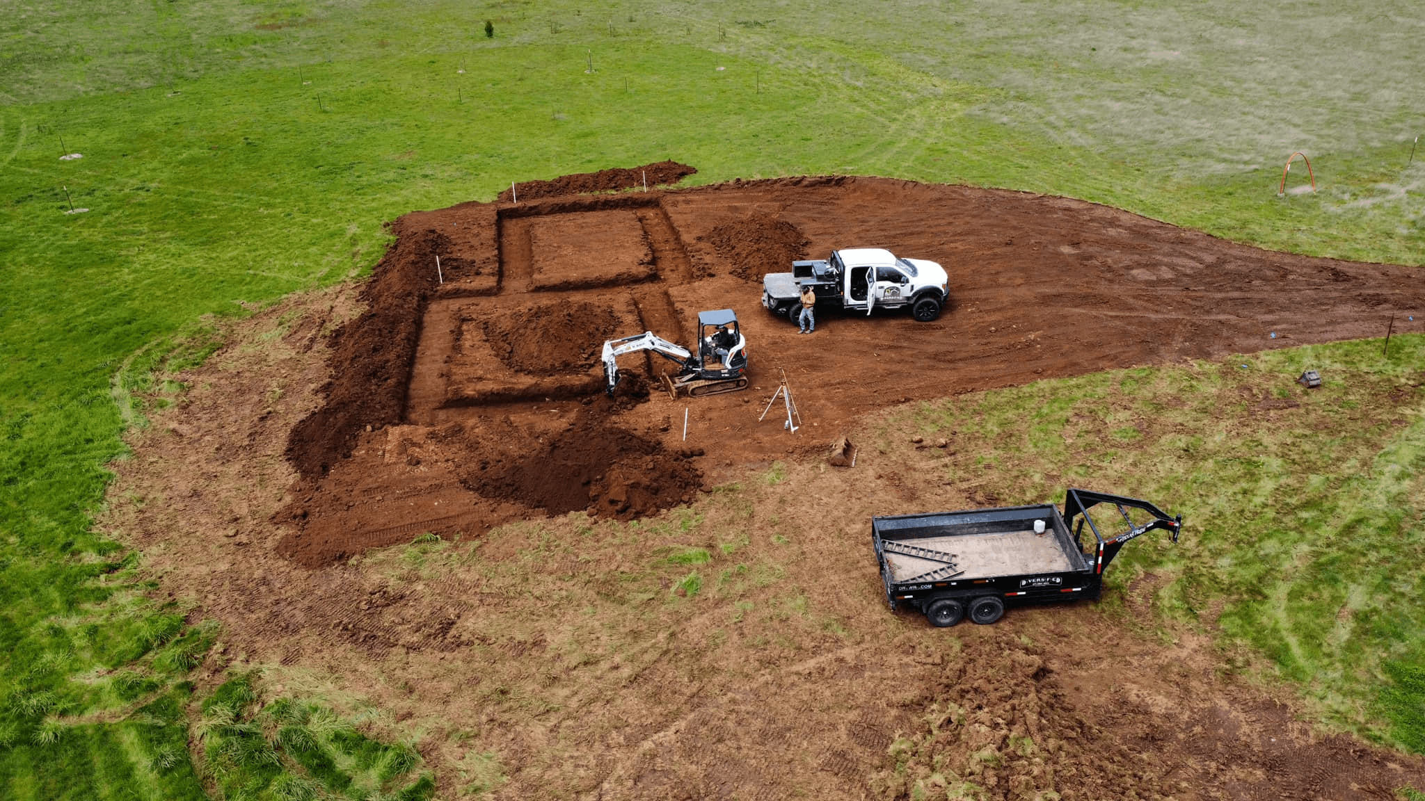 Excavation and foundation site prep using a Bobcat in Molalla