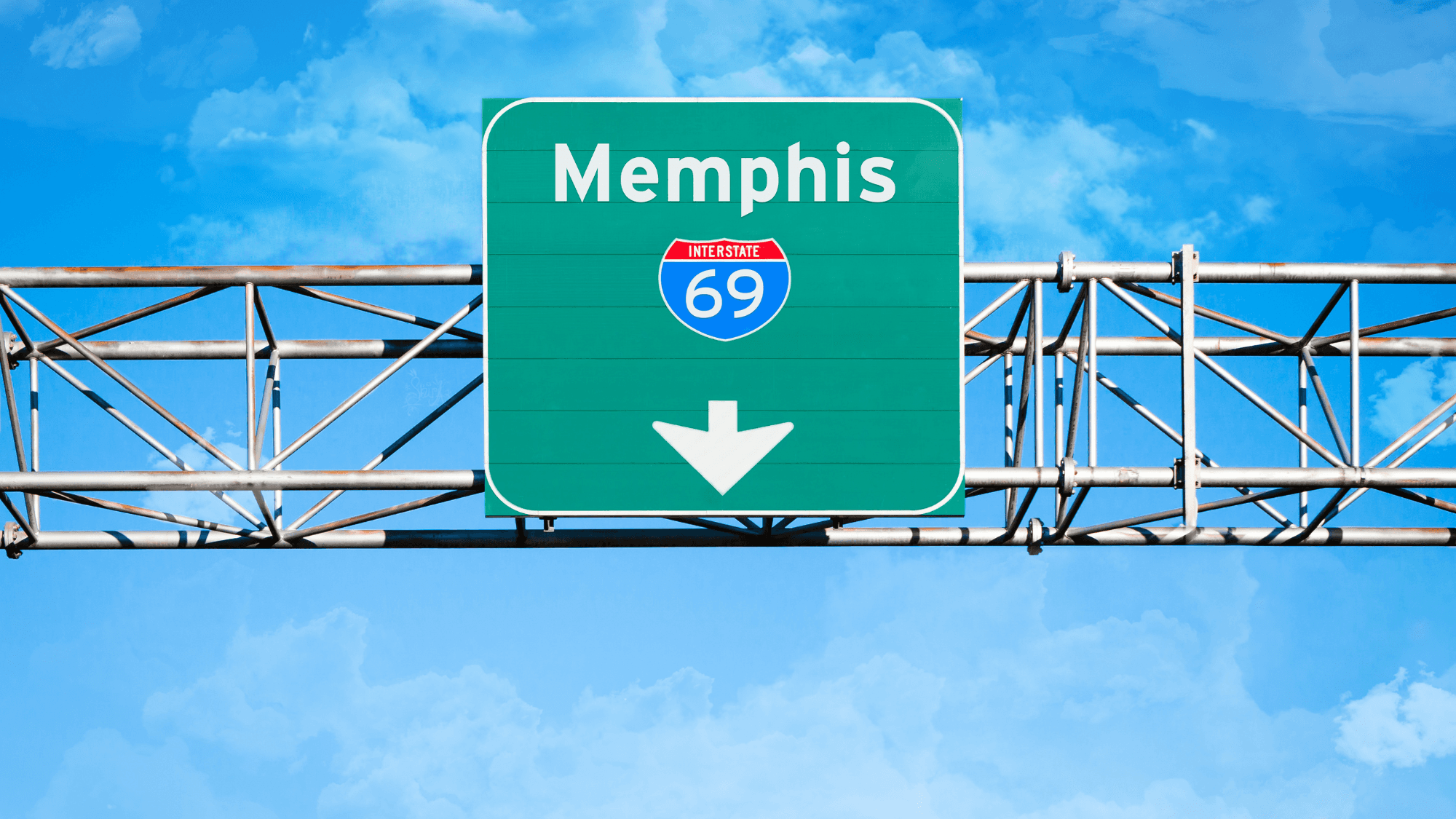 Portrait of a person in dark clothing speaking on a phone