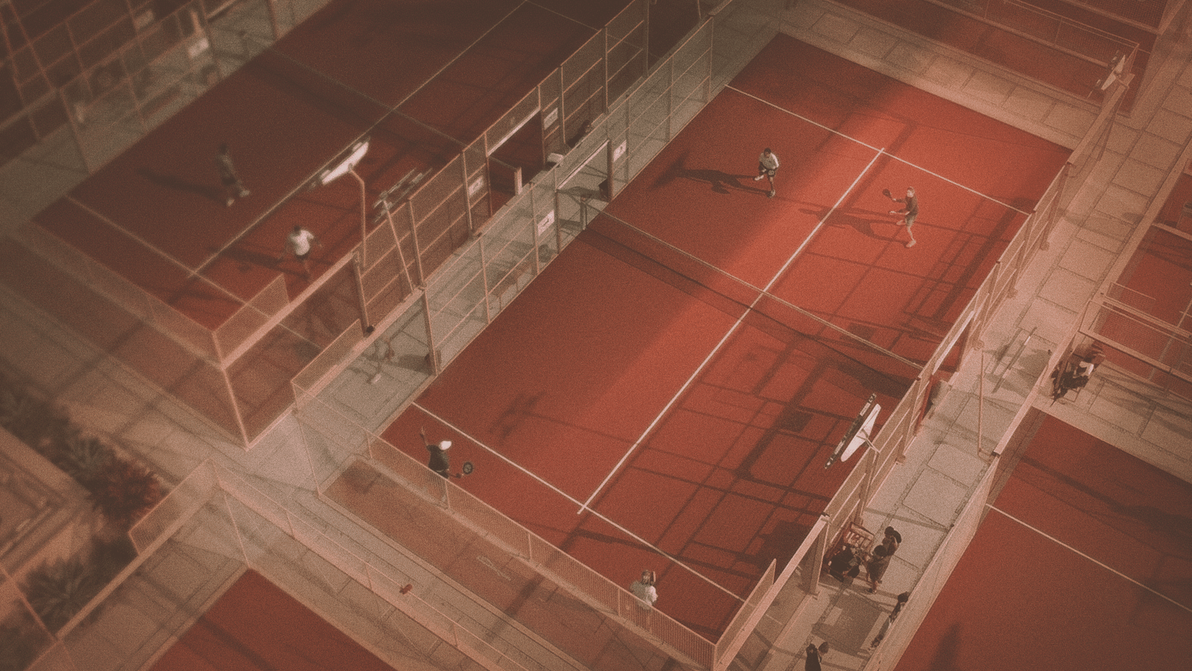 arial shot of walkway between padel courts