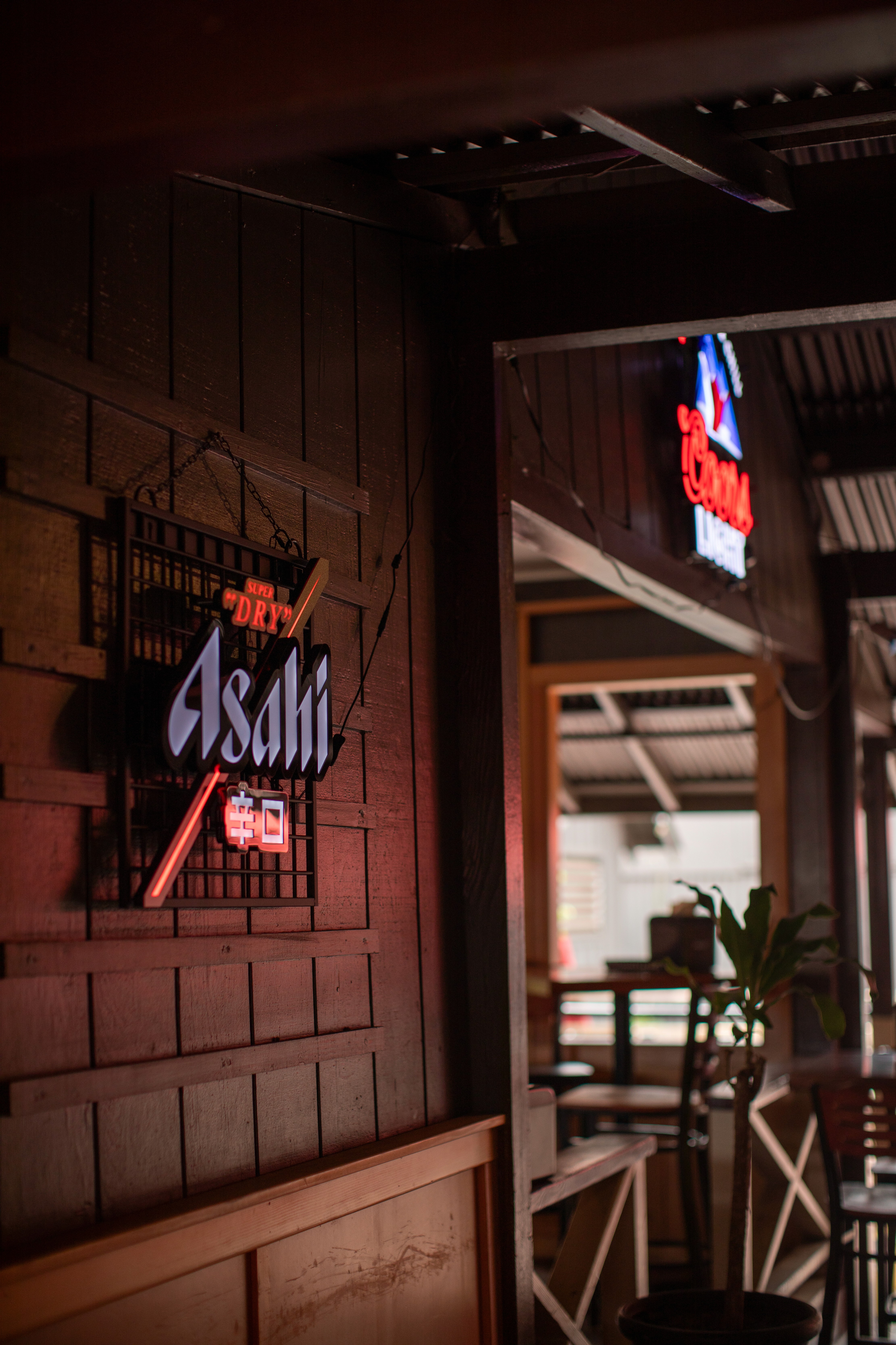 A beautifully arranged table with various dishes, fruits, and wine, evoking a warm dining atmosphere.