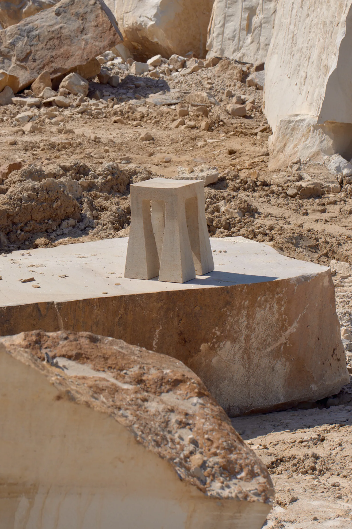 Sand Lada stool in natural quartz sandstone with transparent finish by Jiri Krejcirik