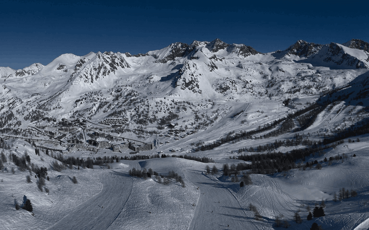 a wooden dock sitting next to a large body of water