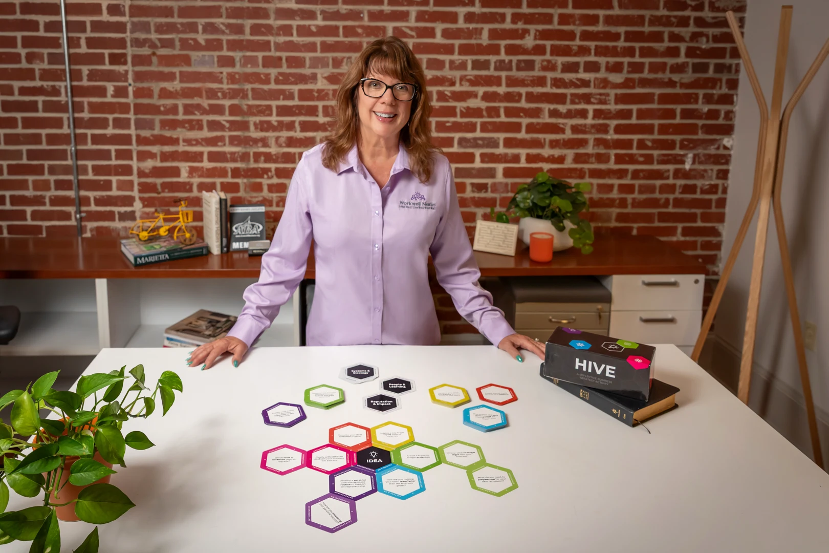 Lori working with HIVE cards