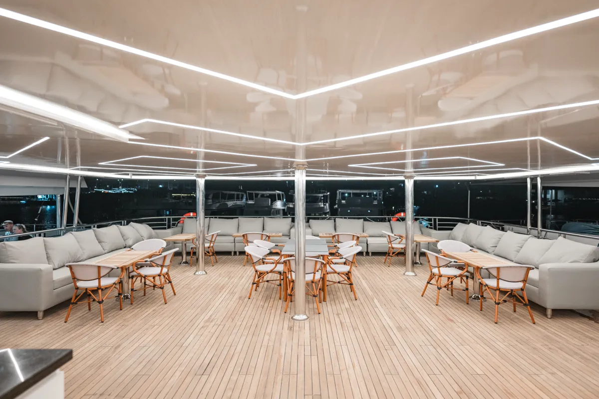 Deck with dining and lounging area on Sea Treasure