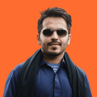 Sara is a client smiling to the camera happily