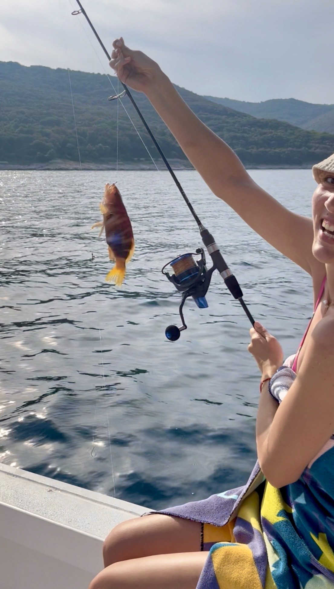 Levante fish and bait tour girl fishing