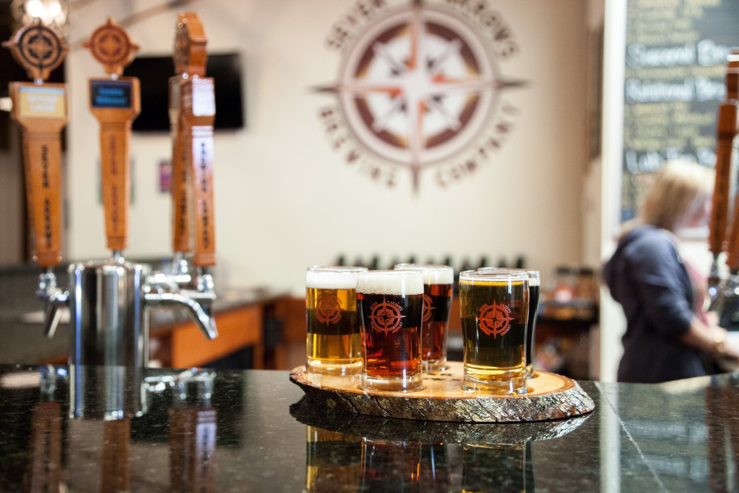 Seven Arrows Brewing Company in Waynesboro, Virginia, is a craft beer lover's paradise that captures the spirit of the Shenandoah Valley. This family-friendly brewery offers a diverse range of 13 rotating drafts, from crisp lagers to bold IPAs, each crafted with locally-sourced ingredients.