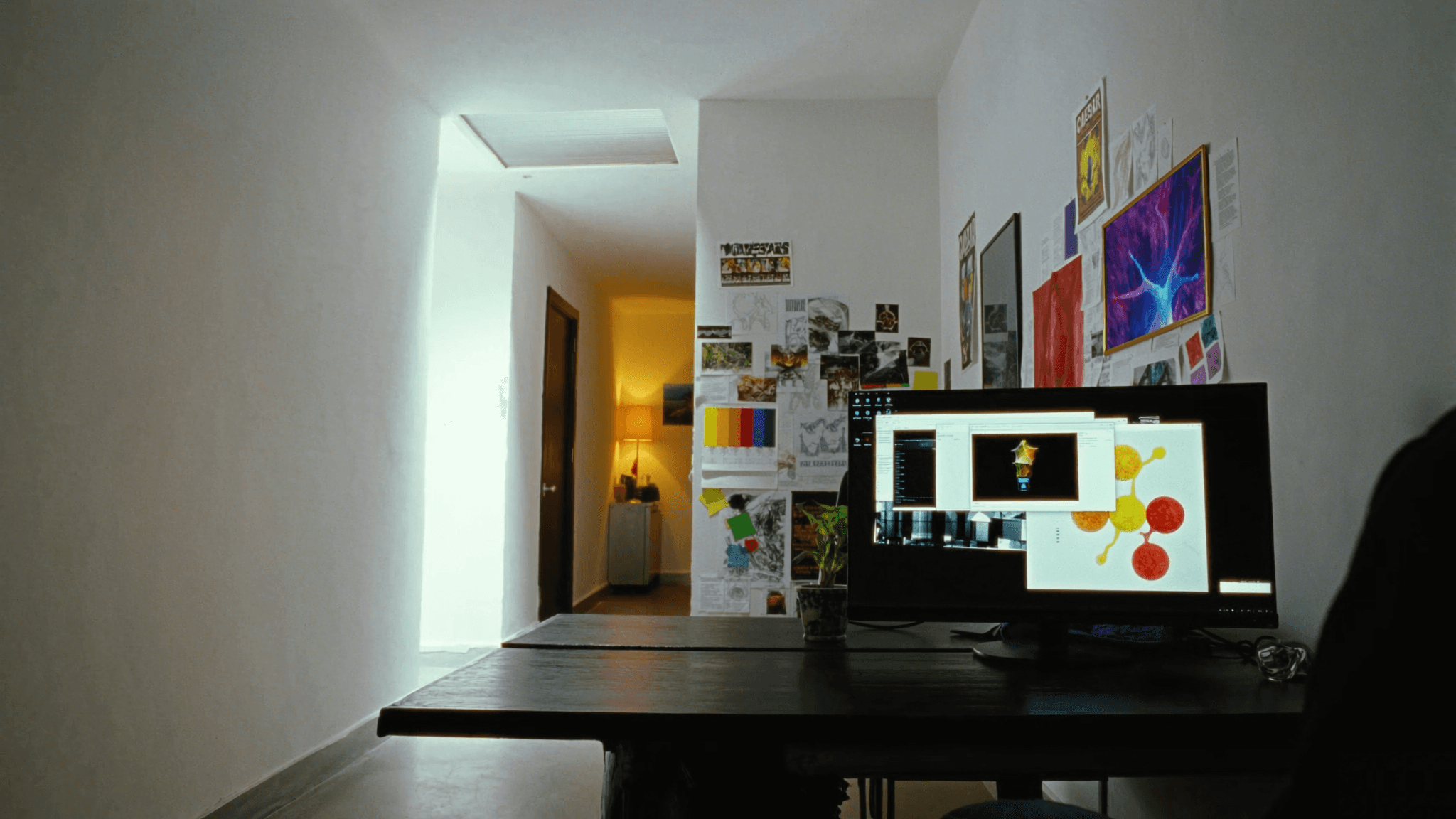 Creative studio workspace with AI-powered design tools on screen