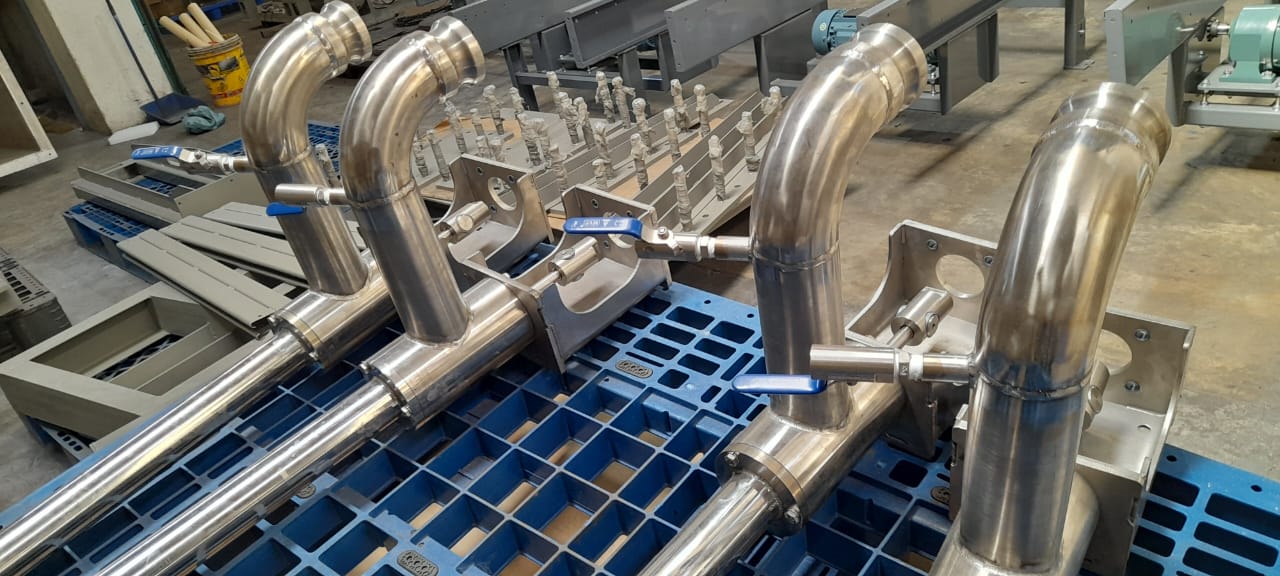 Nozzle holder fabrication, showing the custom component for precise product filling.	